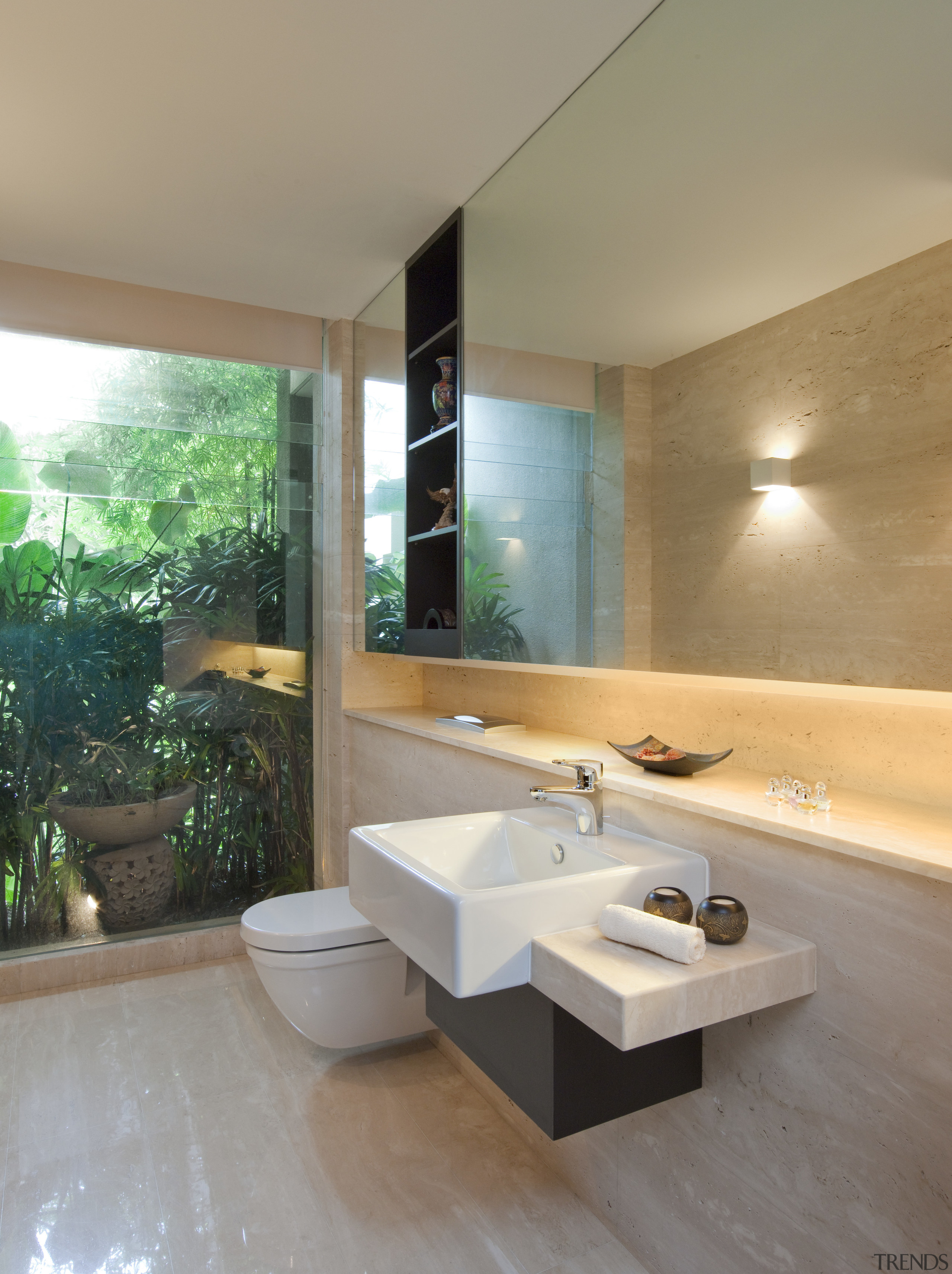 View of a renovated master suite with bathroom, architecture, bathroom, floor, interior design, room, sink, gray