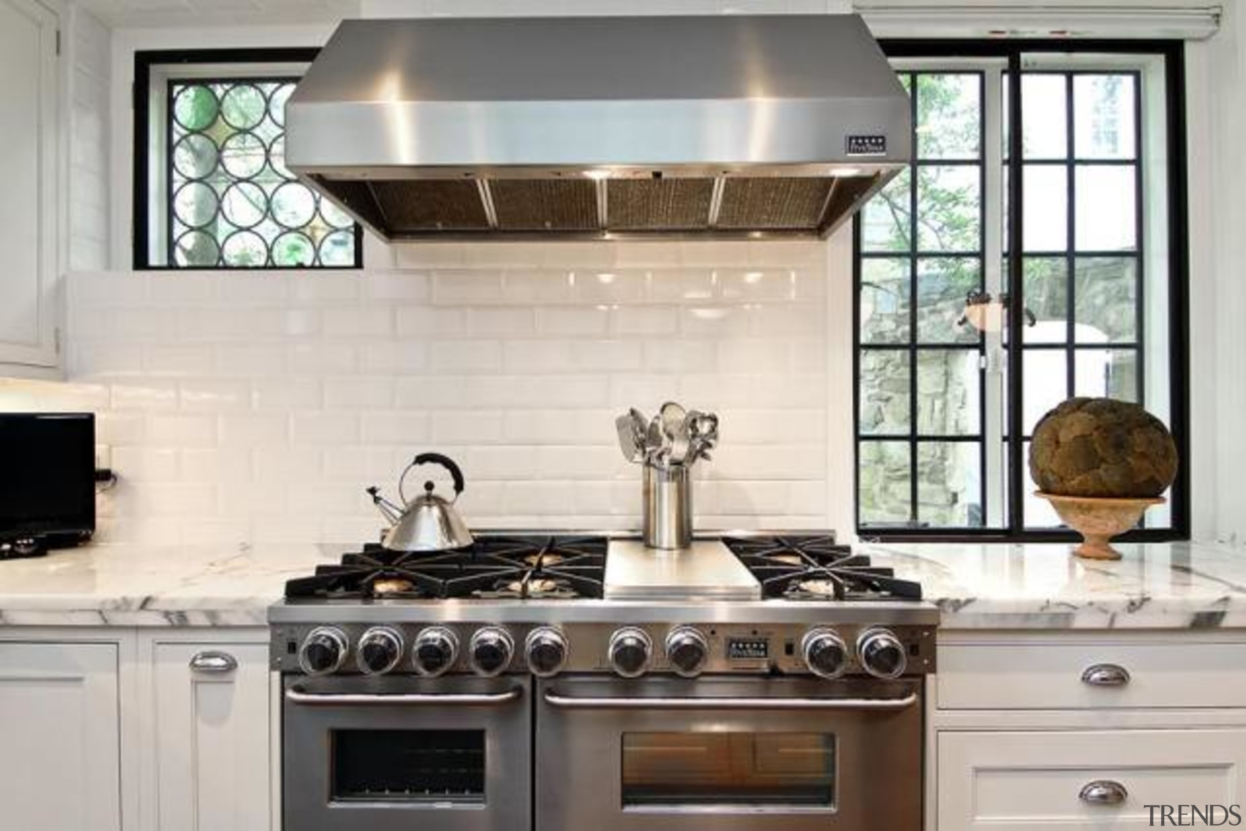 Original story from Trulia cabinetry, countertop, cuisine classique, flooring, home appliance, interior design, kitchen, kitchen appliance, kitchen stove, white, gray