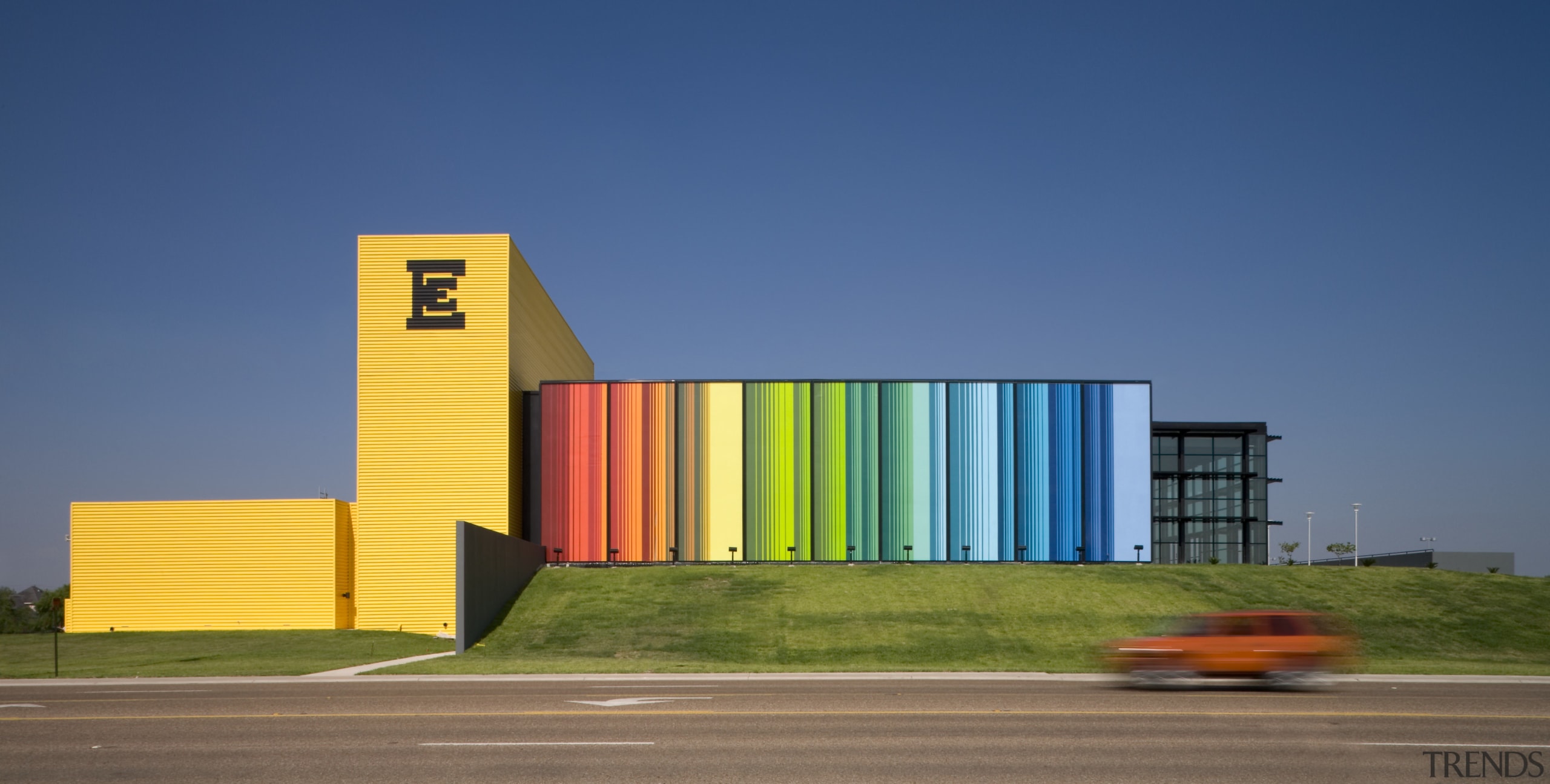 Exterior view of the Edcouch-Elsa Fine Arts Centre architecture, building, daytime, facade, sky, yellow, blue