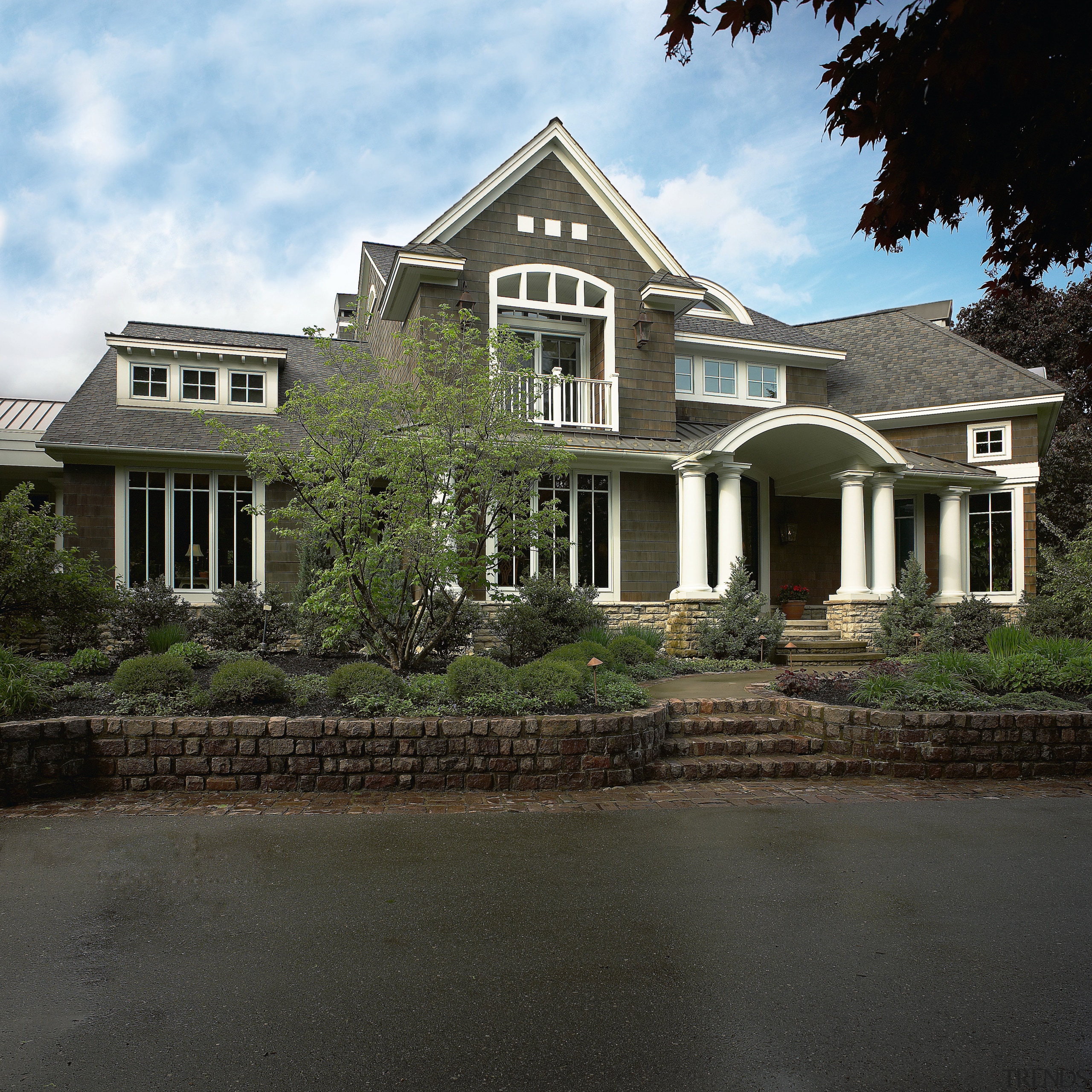 An exterior view of the home. - An building, cottage, estate, facade, farmhouse, historic house, home, house, mansion, property, real estate, reflection, residential area, roof, siding, suburb, window, black