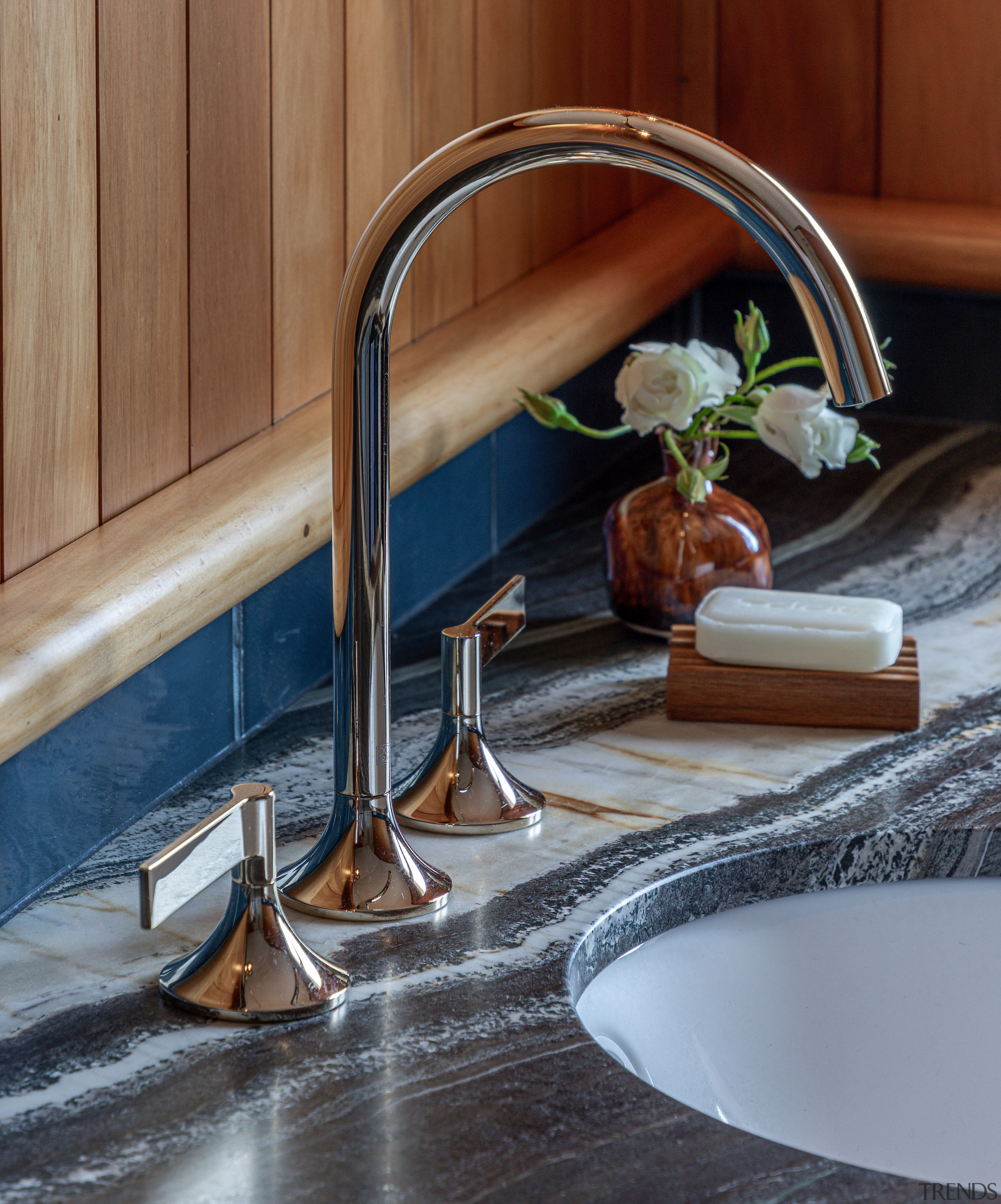 The feature vanity benchtop boasts veins of black 