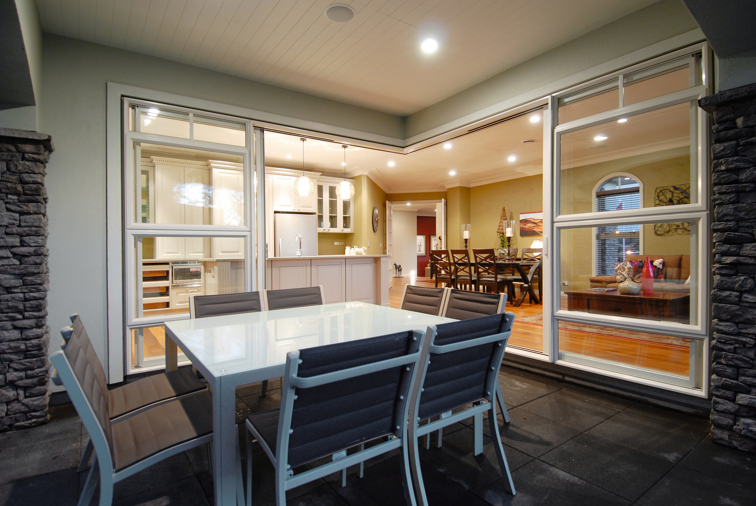 A view of a home designed and built ceiling, dining room, interior design, real estate, room, black, gray