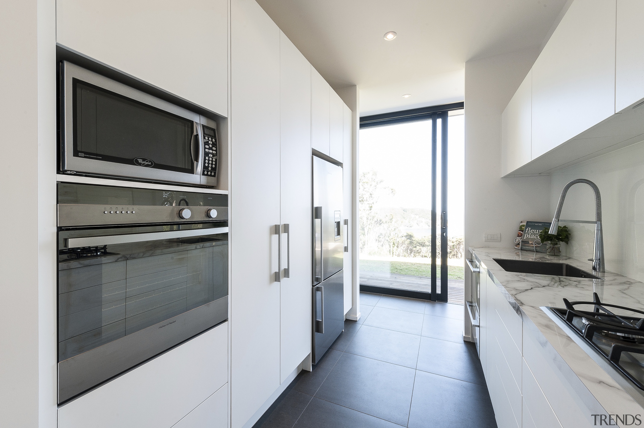 Holistic design by Yellowfox accentuates house and site countertop, home appliance, interior design, kitchen, real estate, white