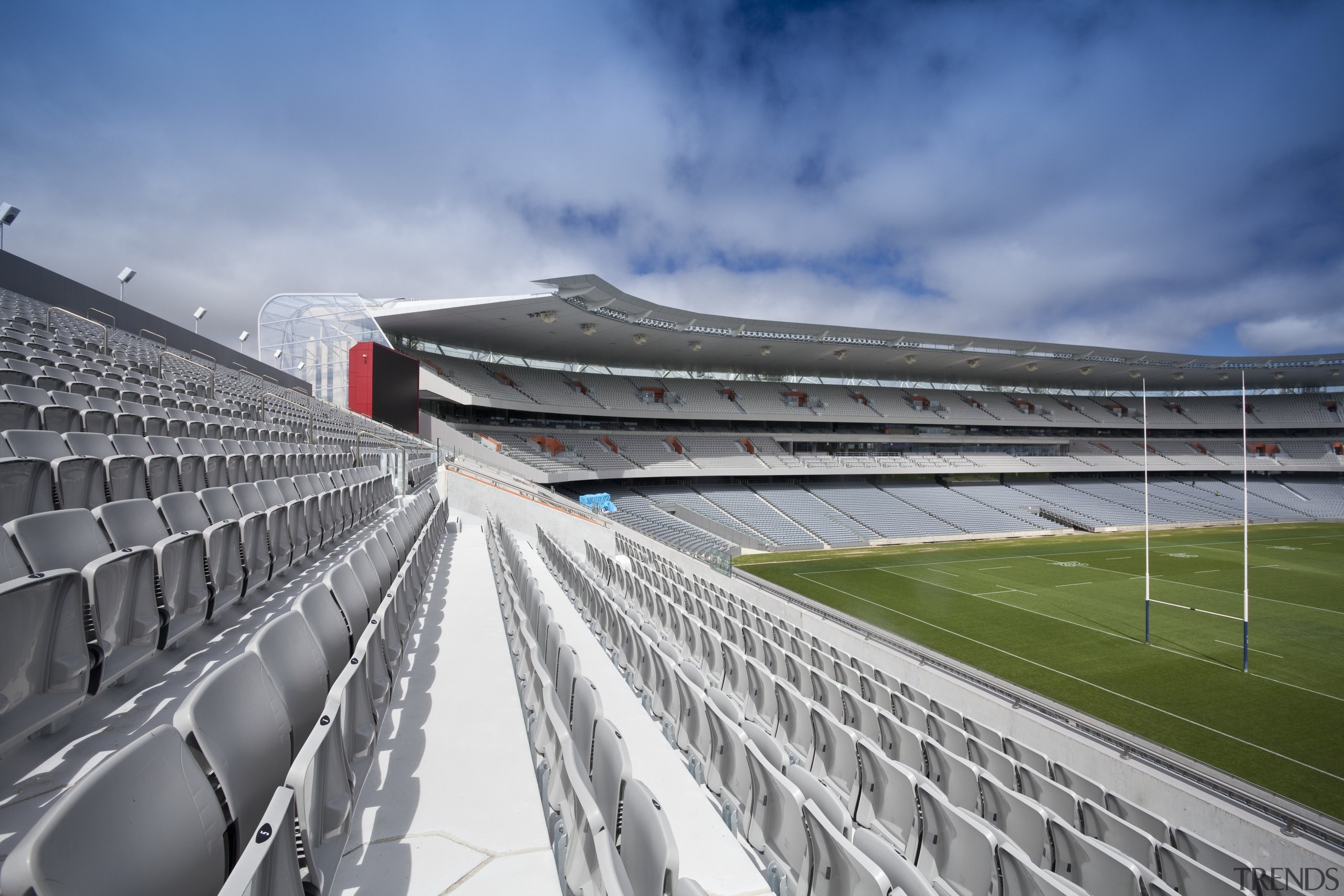 View of Eden Park's new South Stand which architecture, arena, atmosphere, atmosphere of earth, daytime, fixed link, line, metropolitan area, race track, sky, soccer specific stadium, sport venue, stadium, structure, gray