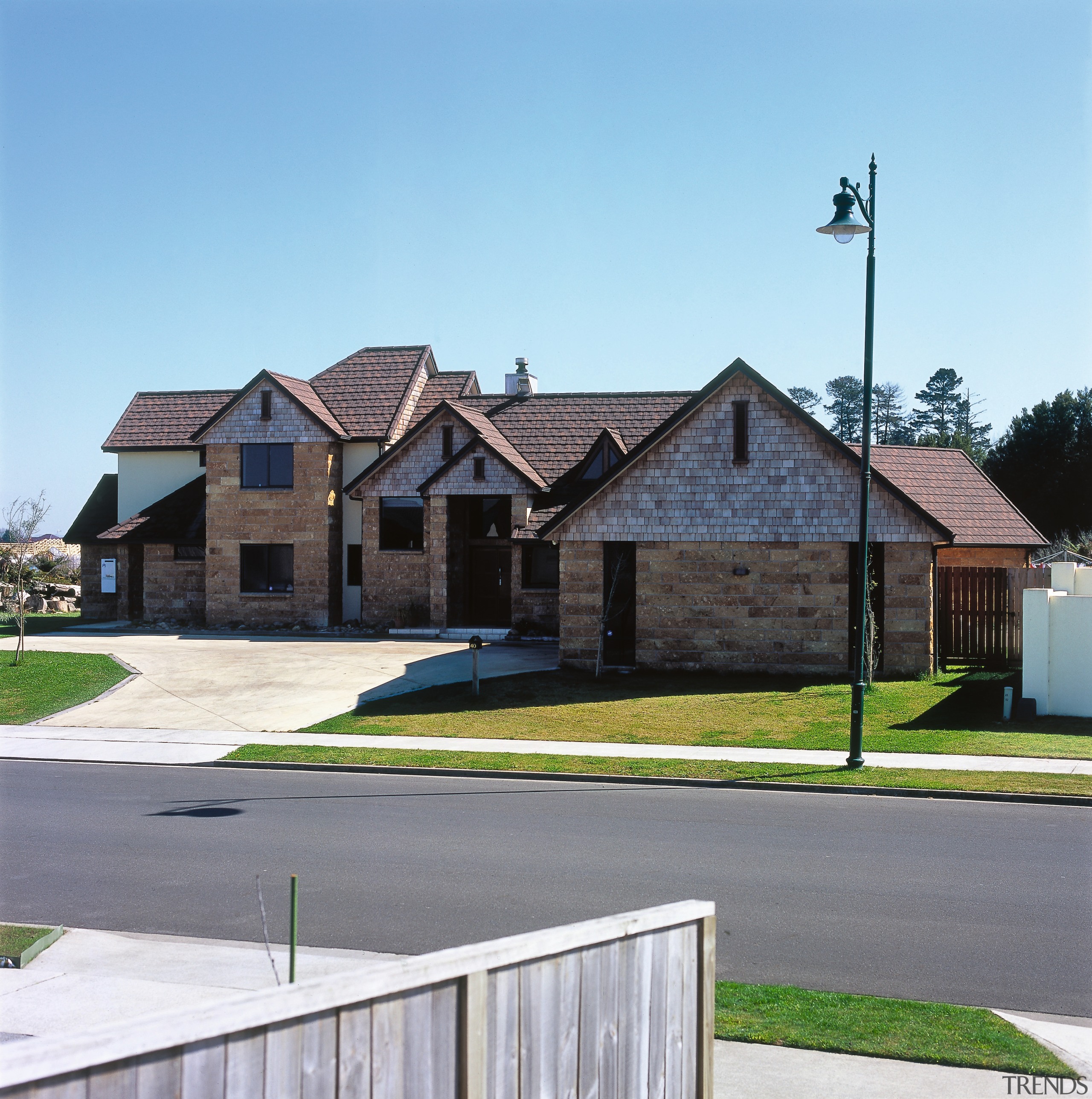 view of the supreme winner in the gerard asphalt, building, cottage, estate, facade, grass, home, house, neighbourhood, property, real estate, residential area, roof, siding, sky, suburb, teal