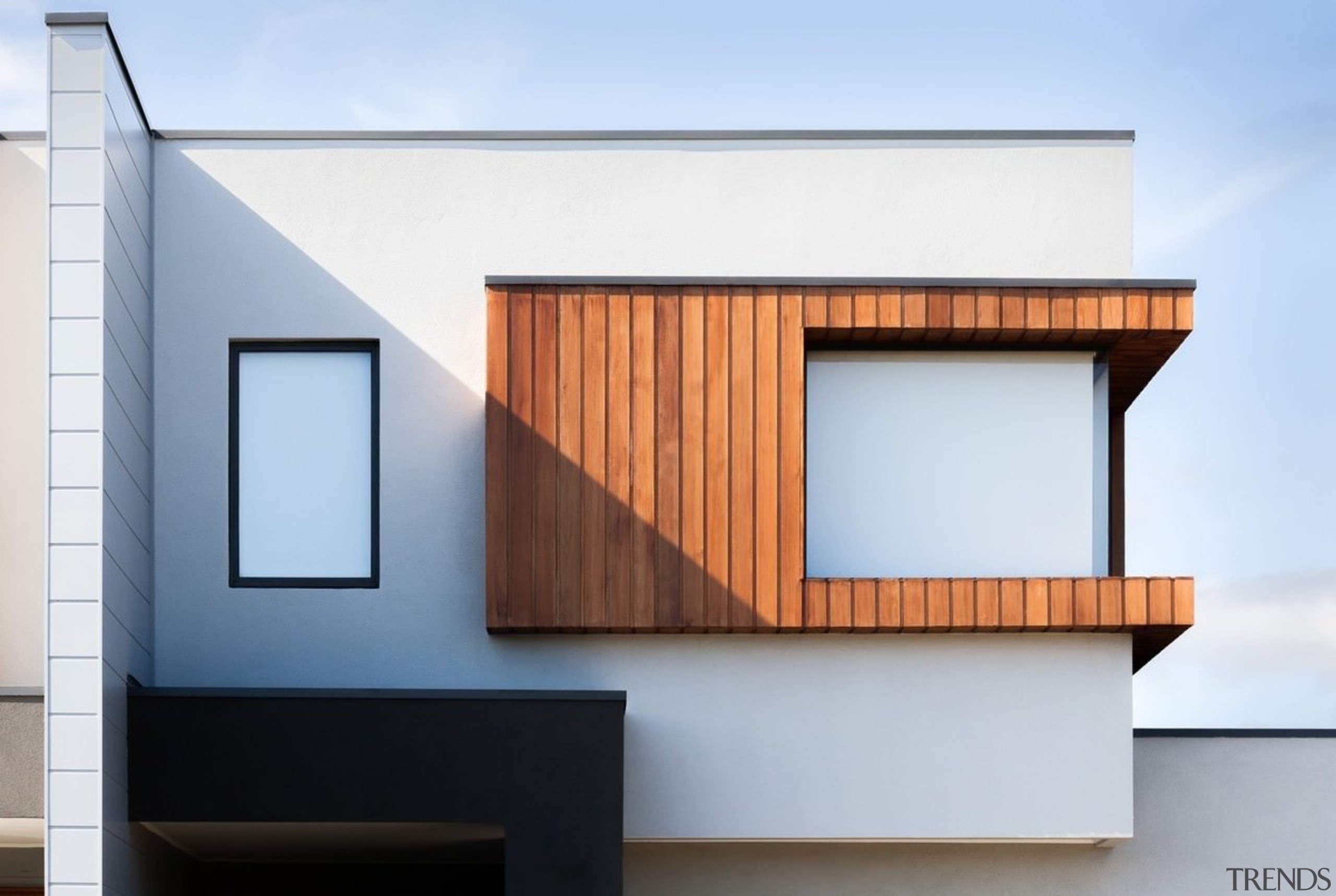 The wood framing this window makes for an architecture, building, facade, home, house, product design, white