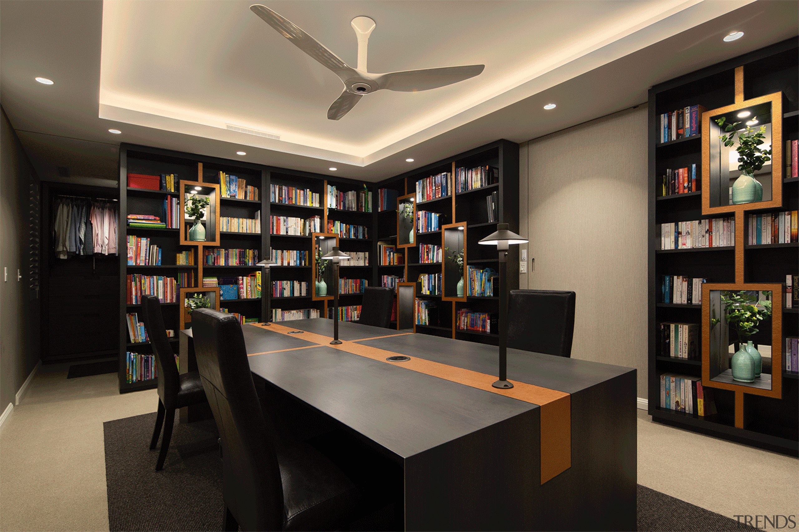 The library includes a custom 4-way desk with 