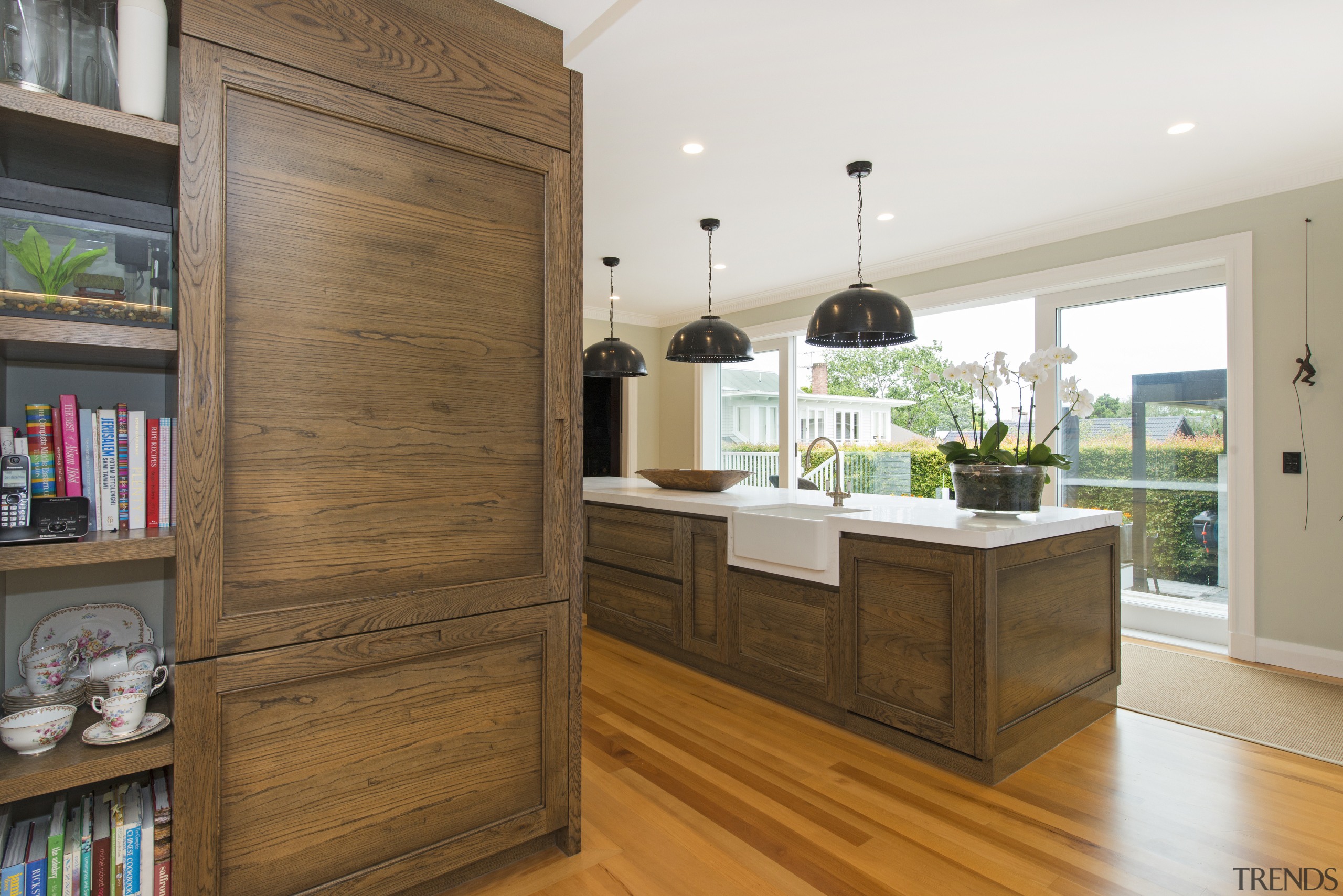 An antiqued oak cabinet with open shelves for cabinetry, hardwood, interior design, kitchen, room, wood, brown, white