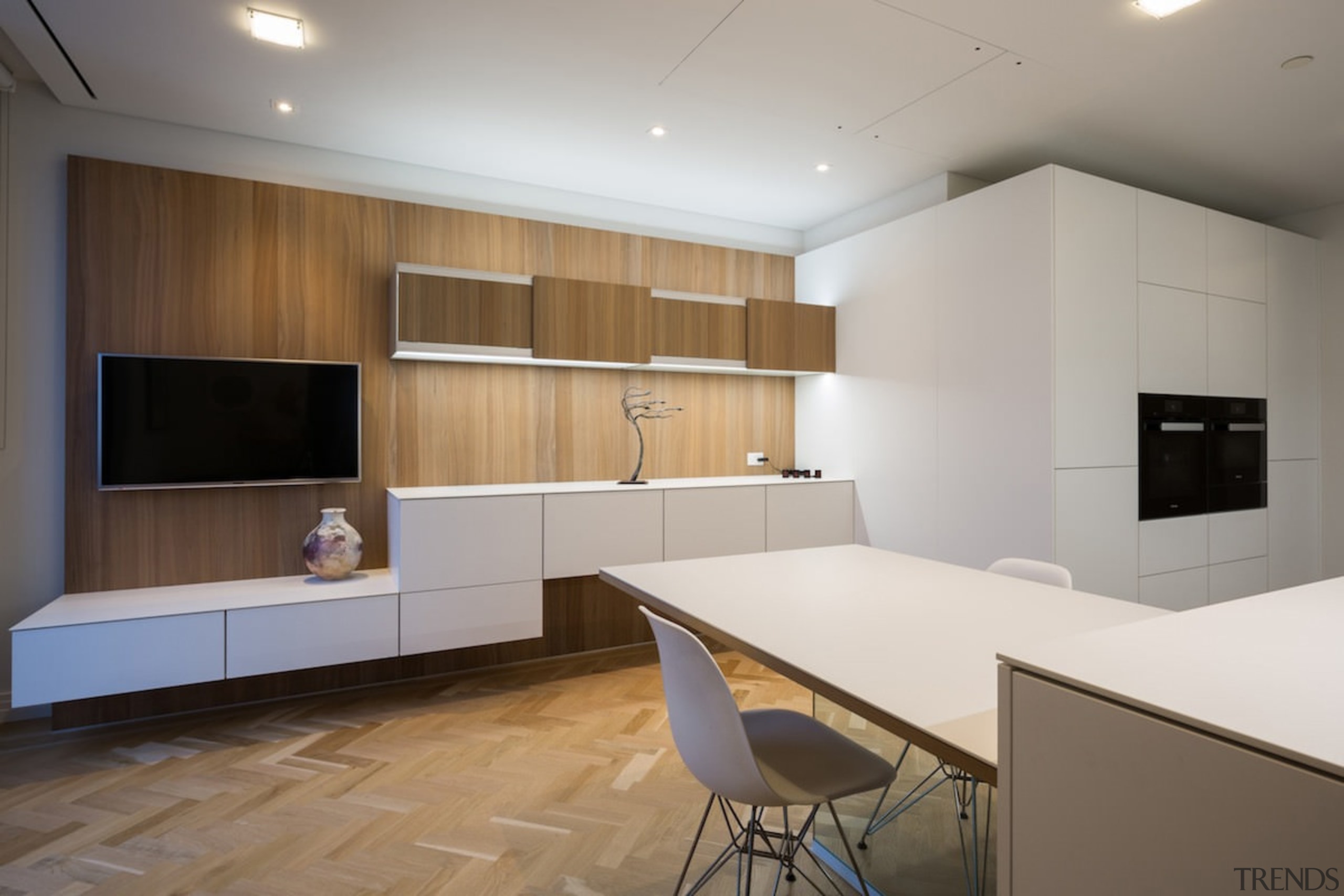 The high shelves are another opportunity to introduce architecture, ceiling, floor, flooring, interior design, kitchen, real estate, room, wood flooring, gray