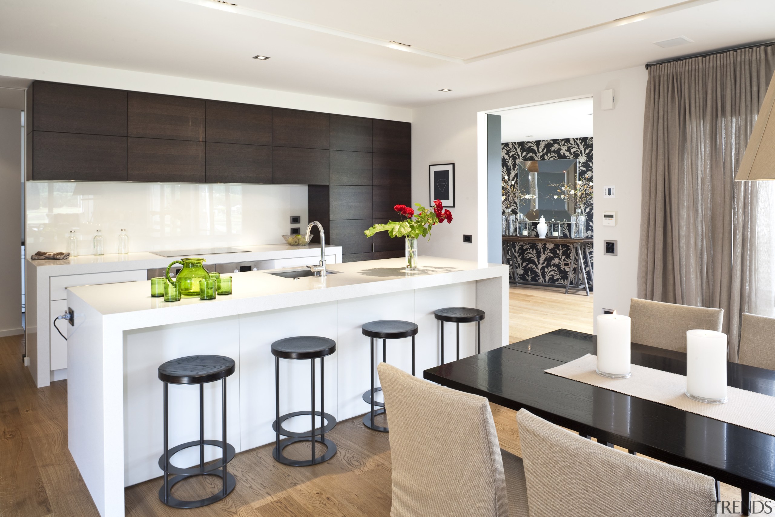 View of kitchen and dining area which features countertop, cuisine classique, interior design, kitchen, real estate, room, white