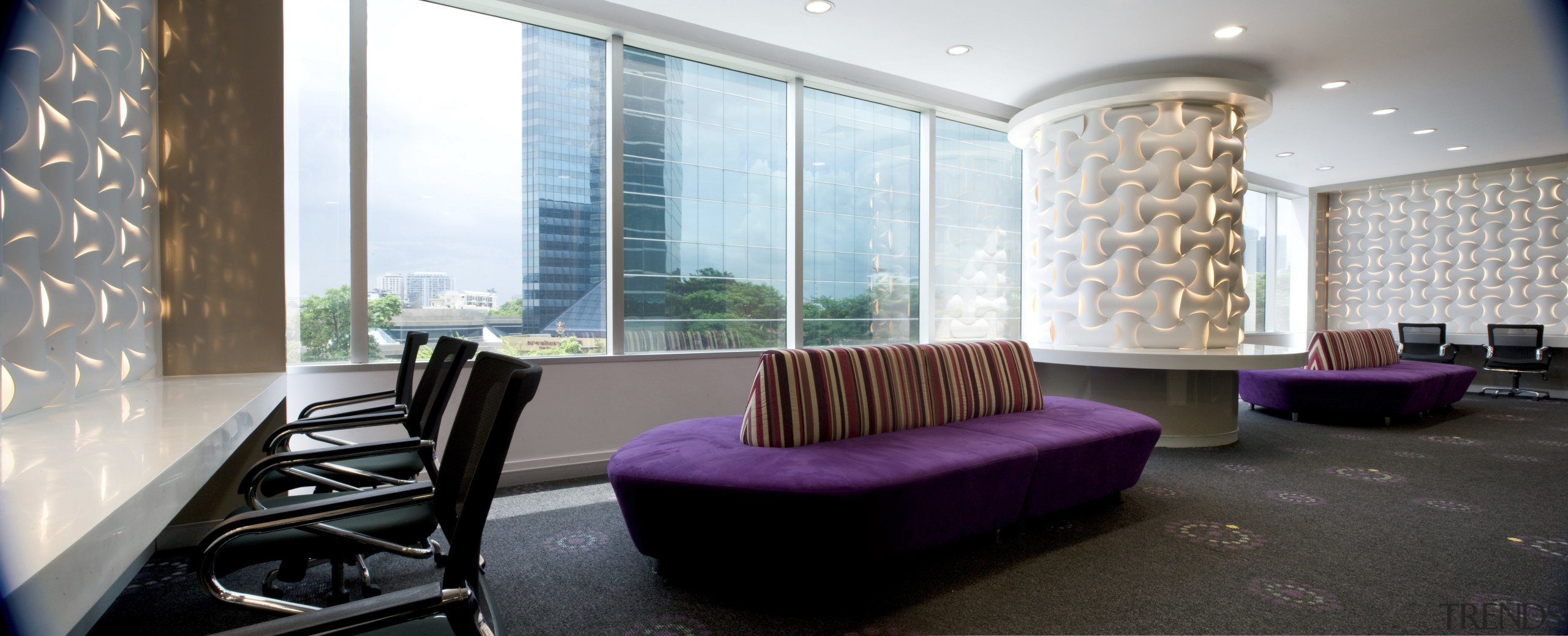 View of seating area with purple couches and ceiling, interior design, lobby, real estate, white, black