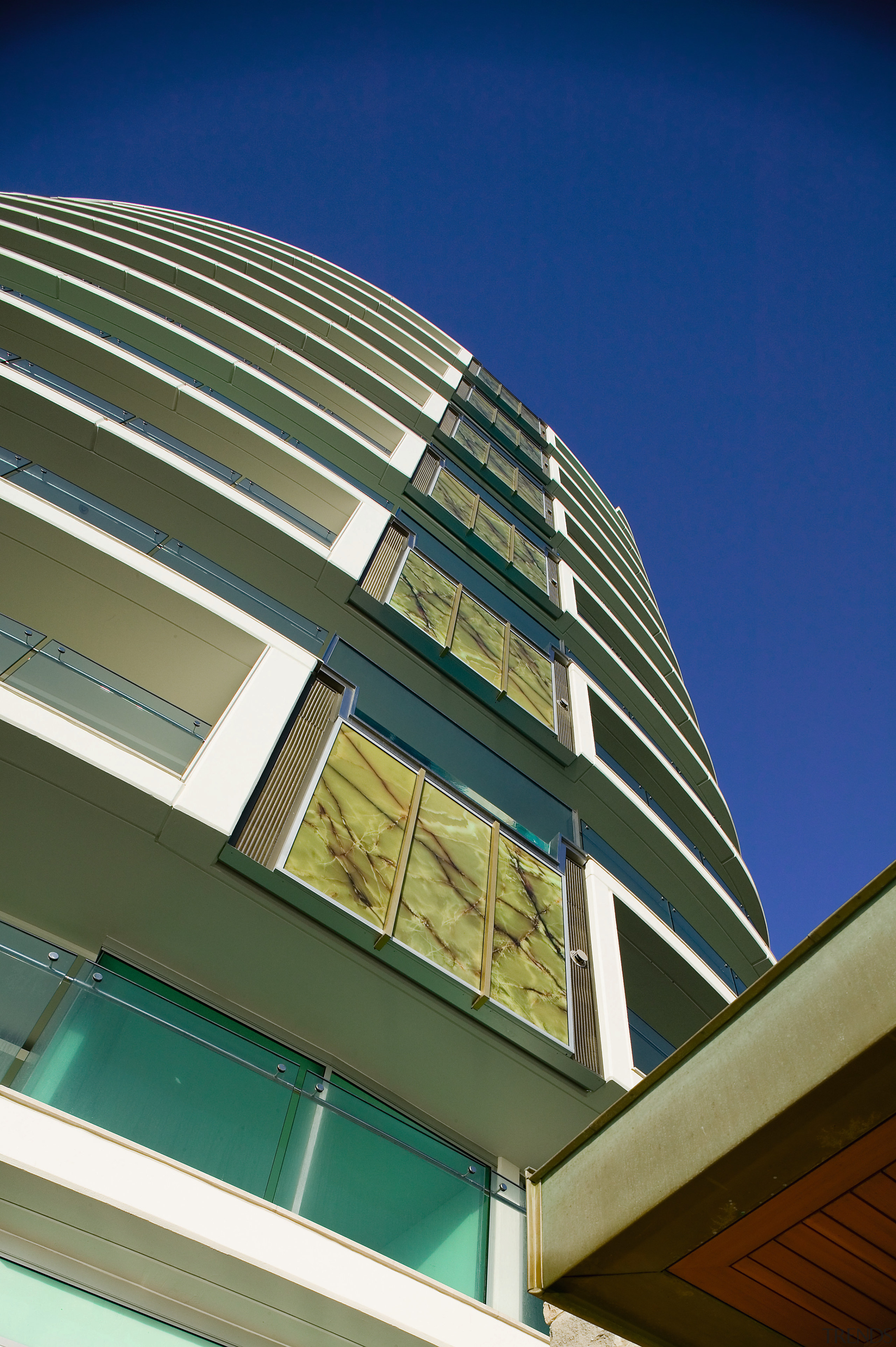 An exterior view of the Jade apartment tower angle, architecture, building, commercial building, condominium, corporate headquarters, daylighting, daytime, facade, headquarters, house, landmark, line, metropolitan area, mixed use, residential area, sky, skyscraper, tower block, blue, brown