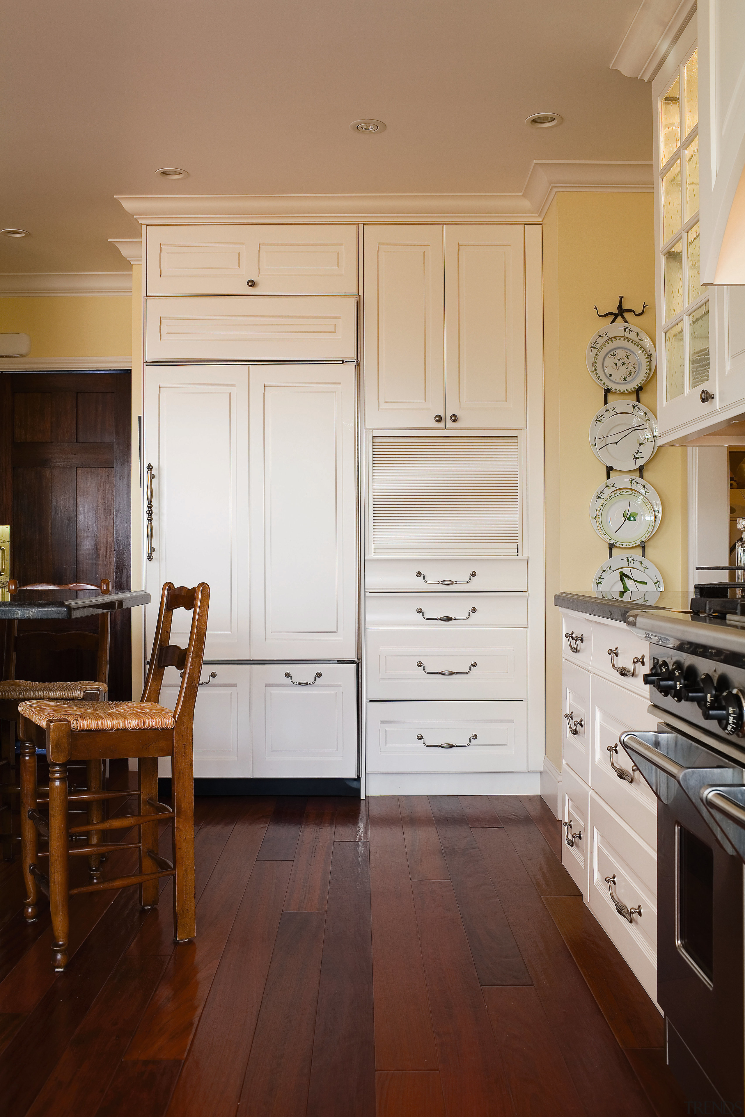 A view of the kitchen area, wooden flooring cabinetry, countertop, cuisine classique, door, floor, flooring, furniture, hardwood, home, interior design, kitchen, laminate flooring, room, window, wood, wood flooring, wood stain, brown, gray