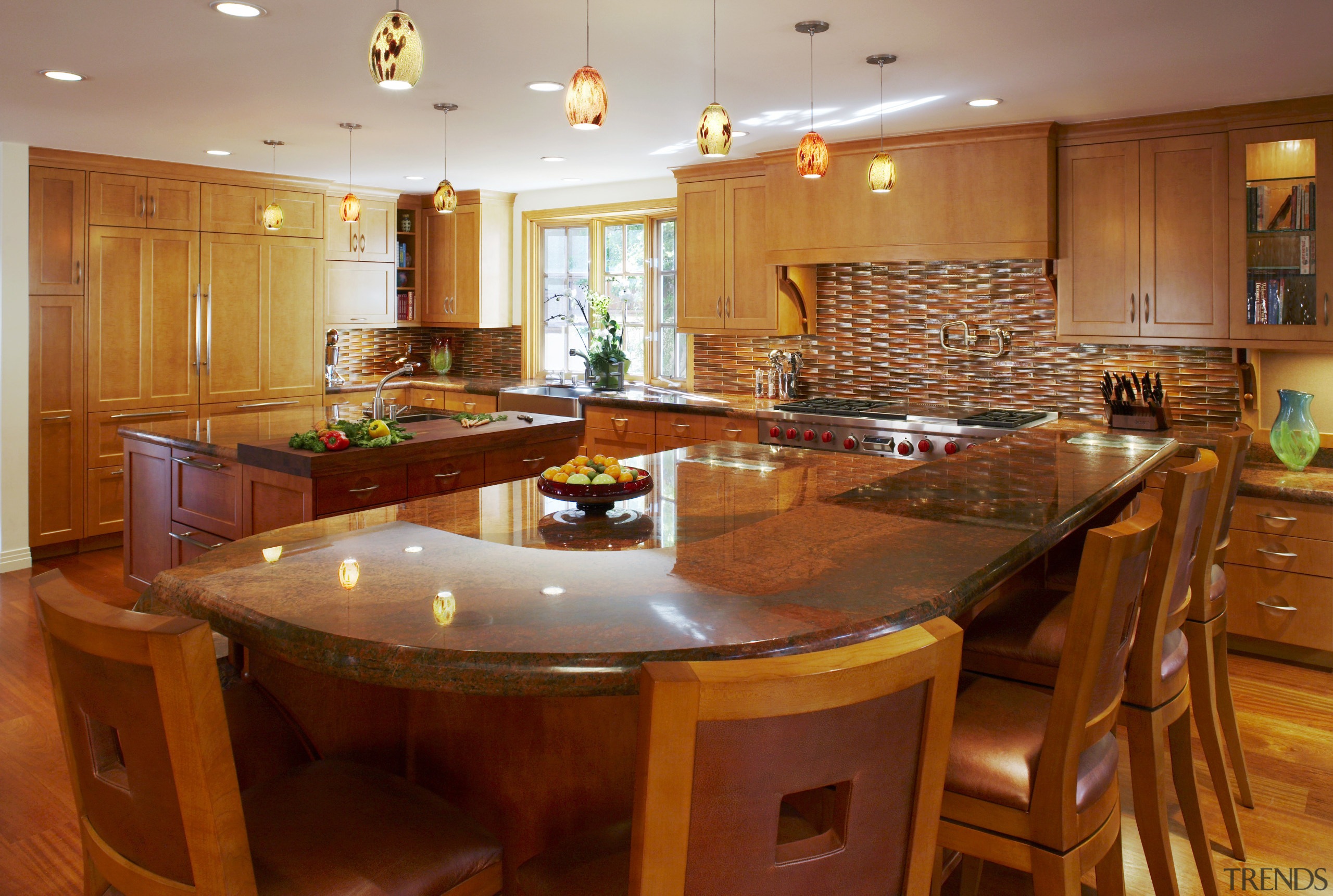 This transitional kitchen, designed by Lisa Steinbach Schecter, cabinetry, countertop, cuisine classique, dining room, flooring, hardwood, interior design, kitchen, real estate, room, brown