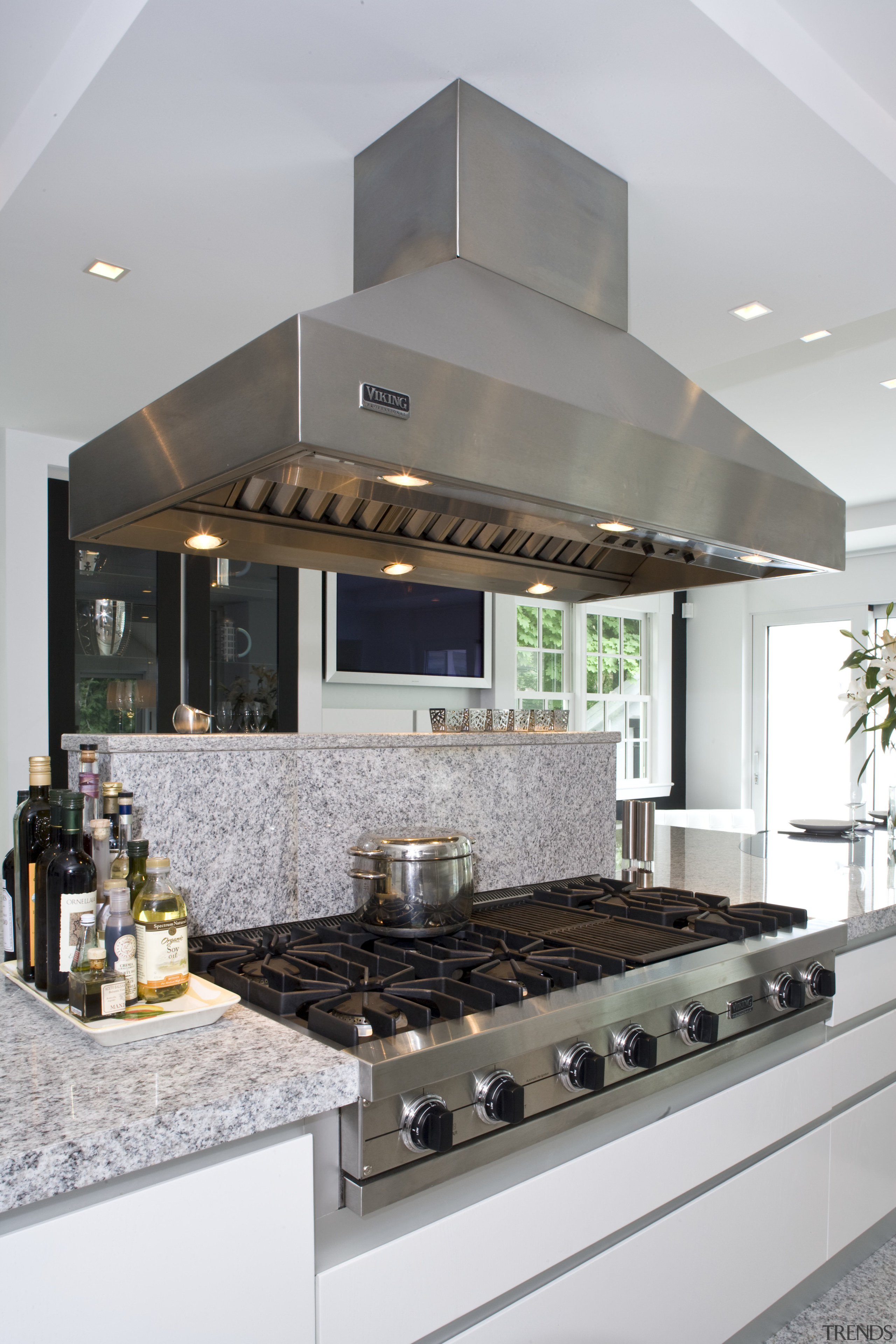 Kitchen has Granite tops and contrasting dark walnut countertop, interior design, kitchen, gray