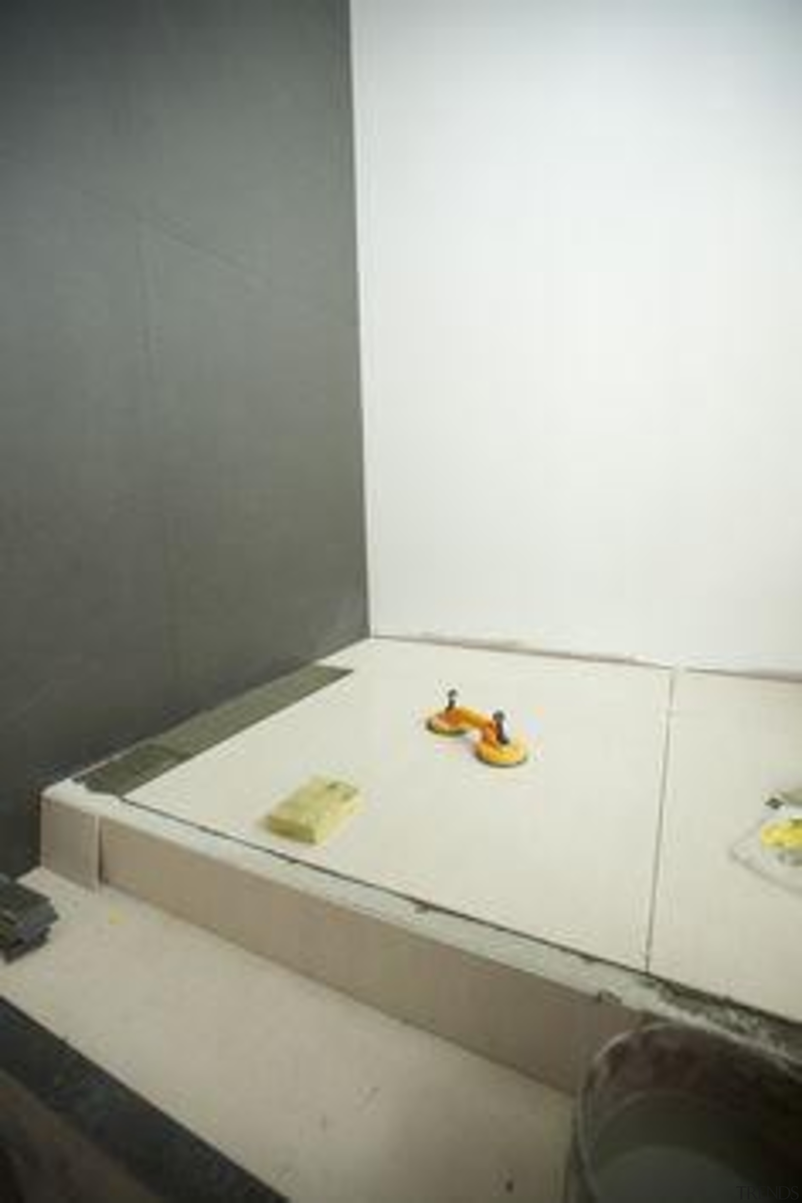 Installation of Naturali travertino avorio on floors. bathroom, bathroom sink, floor, flooring, plumbing fixture, product, product design, sink, table, tap, tile, wall, white, gray