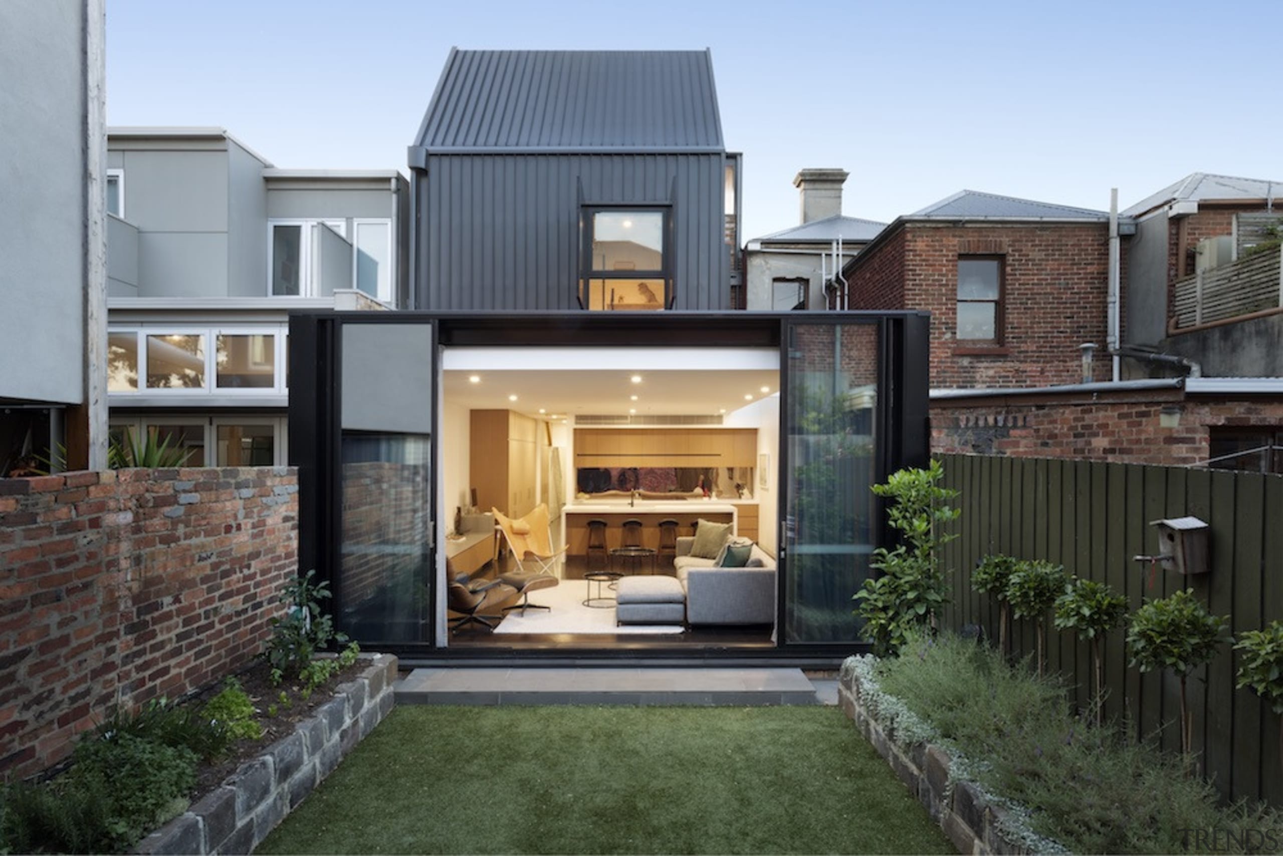 The new built form is clothed in a architecture, backyard, courtyard, elevation, estate, facade, home, house, property, real estate, residential area, gray, black