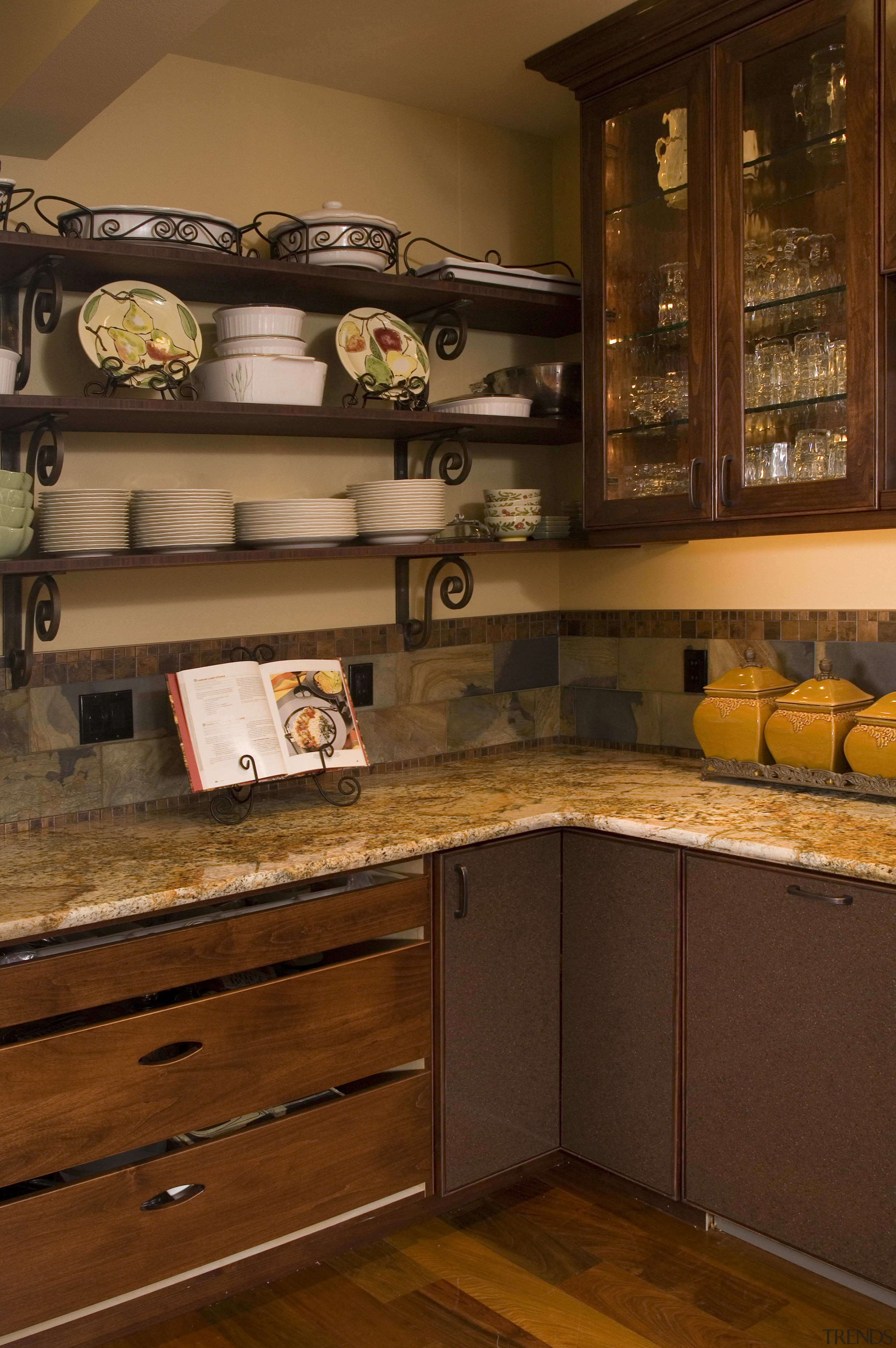 The generous scullery countertops in this traditional kitchen cabinetry, countertop, cuisine classique, furniture, hardwood, interior design, kitchen, kitchen organizer, room, shelf, table, under cabinet lighting, wood, wood stain, brown