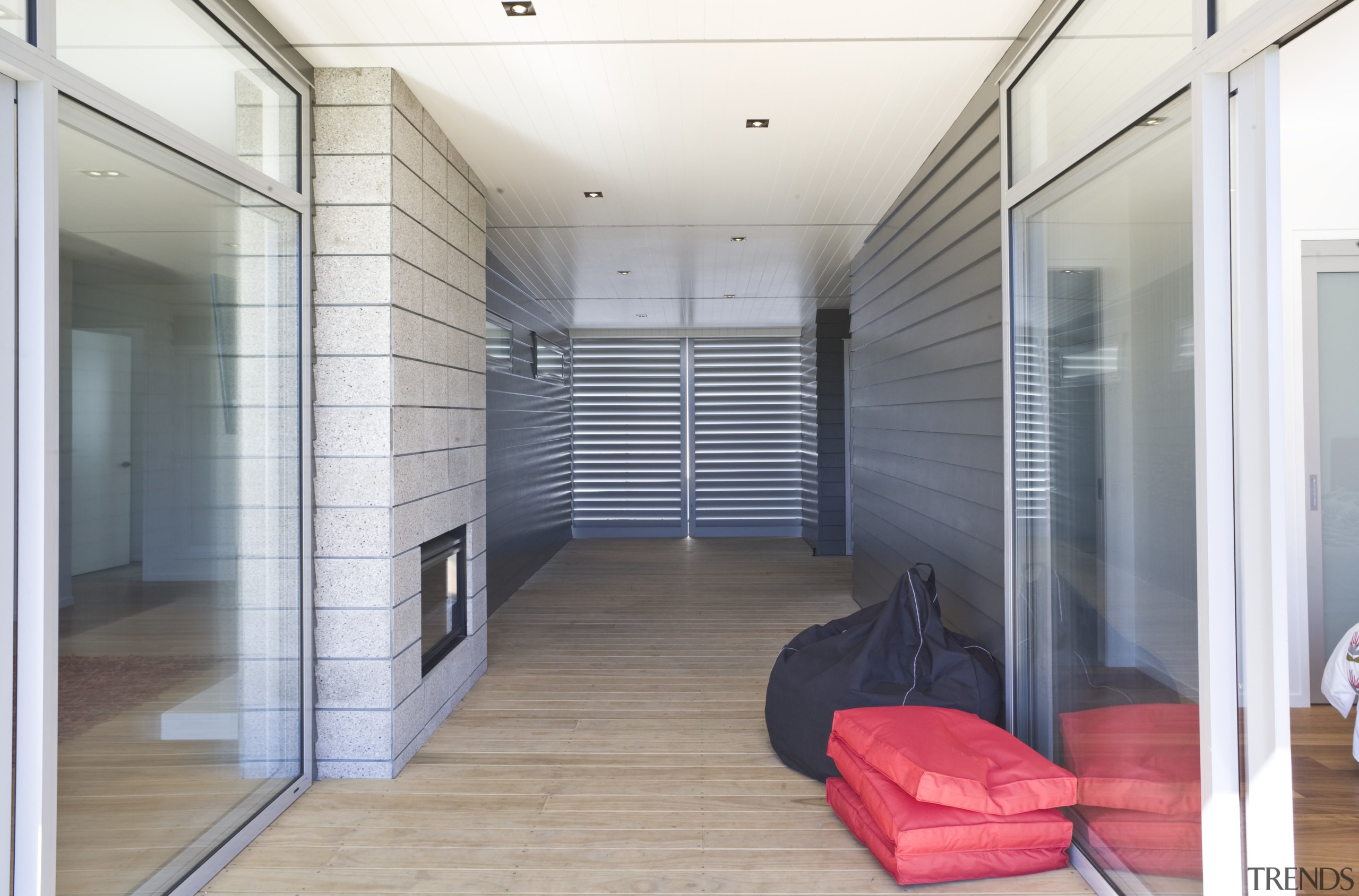 View of a covered pathway with decking and architecture, ceiling, daylighting, floor, house, interior design, real estate, window, white, gray