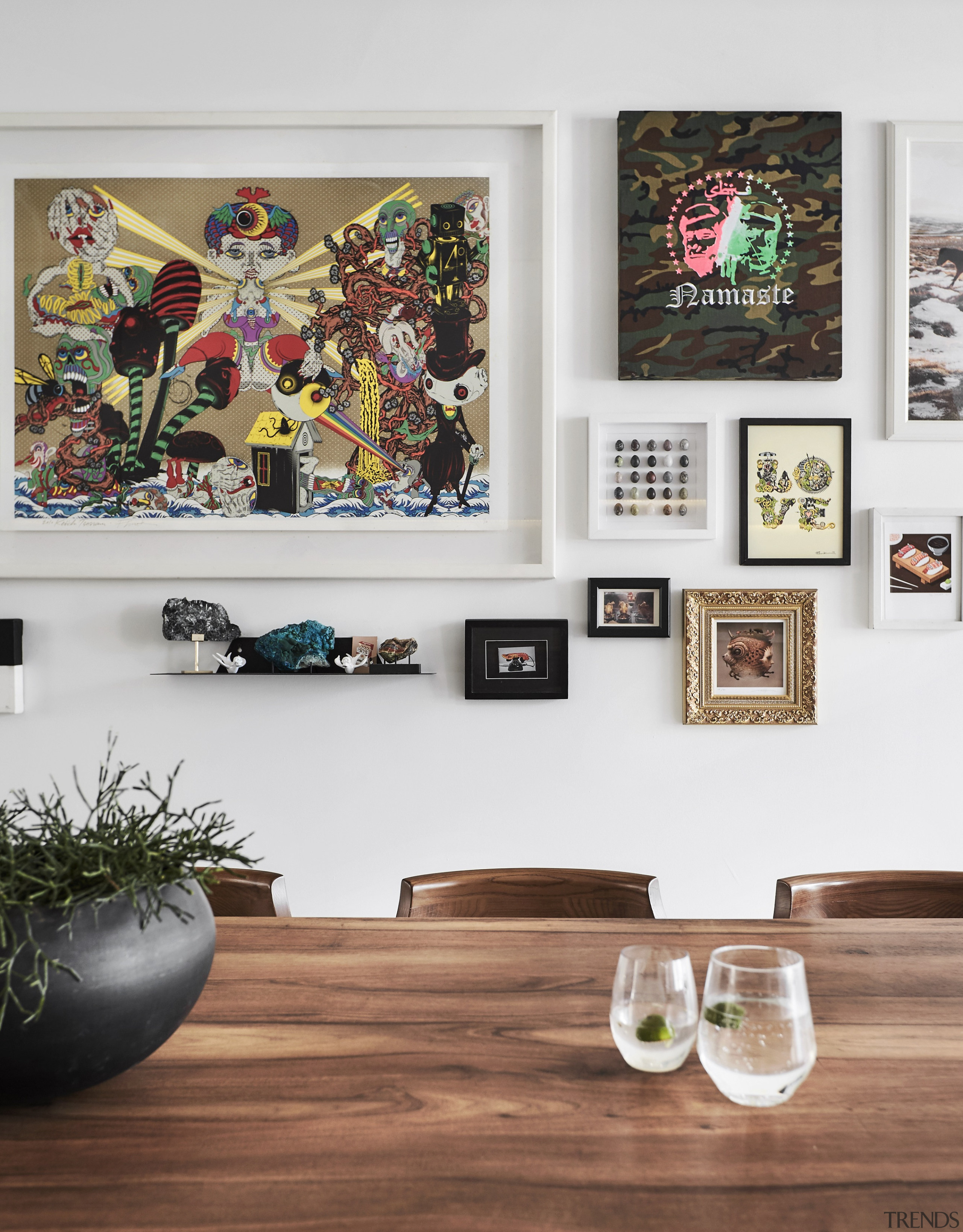 Eclectic artworks cover the walls. - Shared spaces 