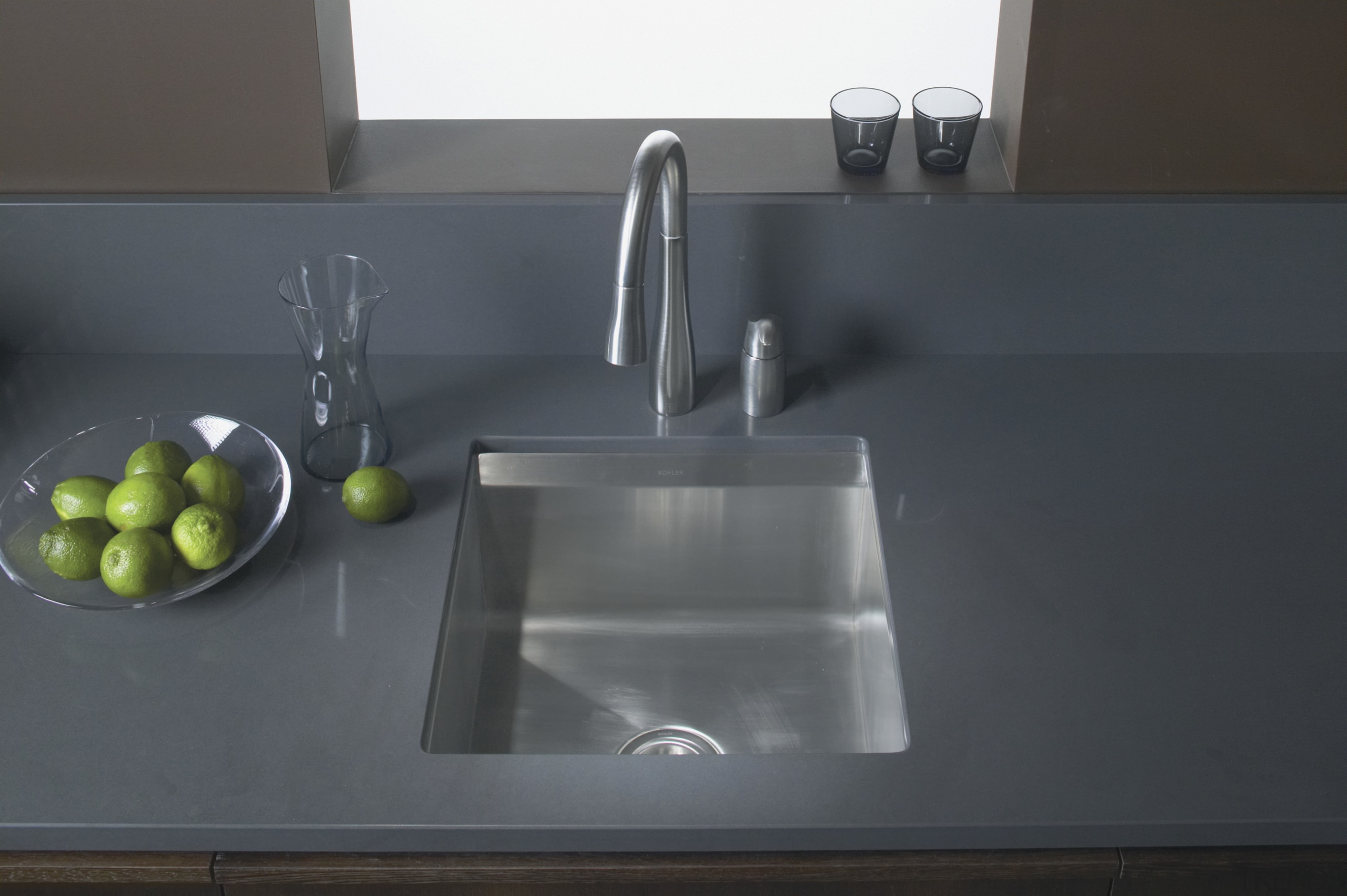 Image of Kohler's new 8 Degree stainless steel bathroom sink, countertop, glass, plumbing fixture, product design, sink, tap, black, gray