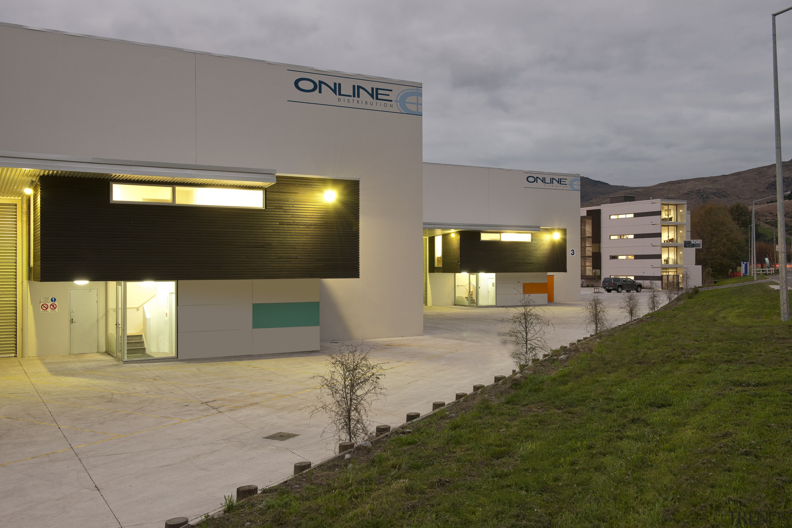 View of a logistics centre designed by Cymon architecture, real estate, gray, brown