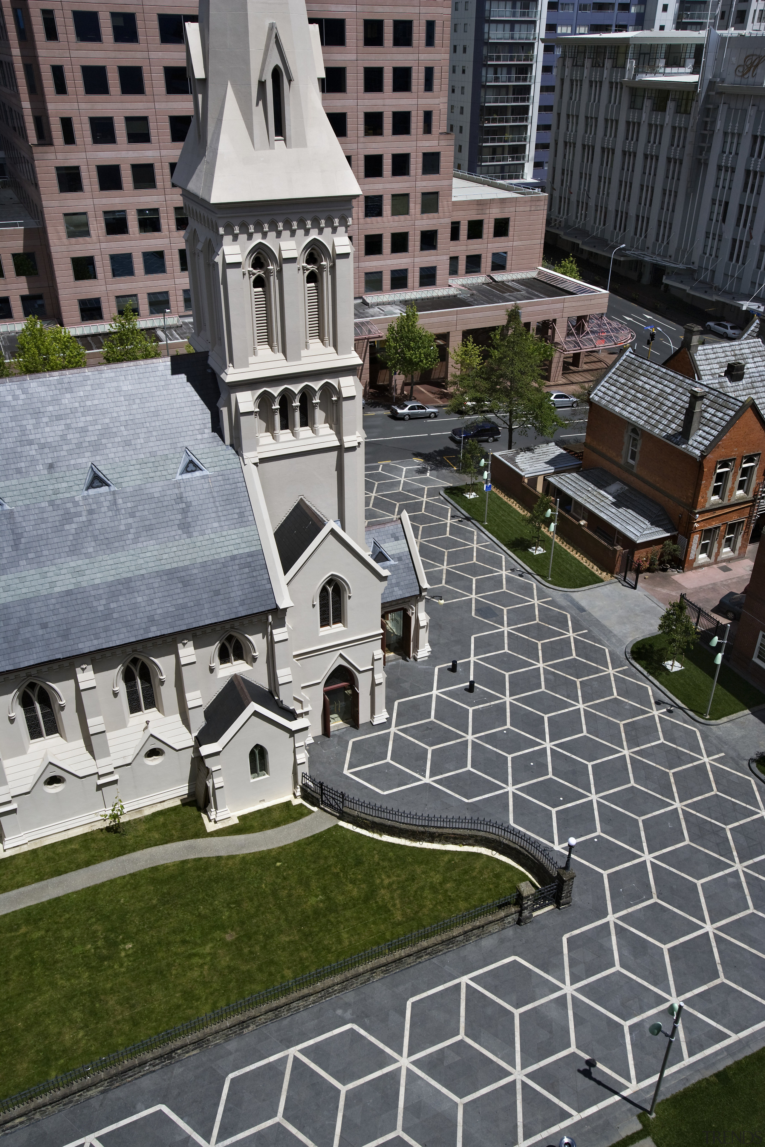 View of St Patrick's square featuring landscaping, paving, architecture, building, city, facade, house, neighbourhood, outdoor structure, residential area, roof, urban area, gray, black