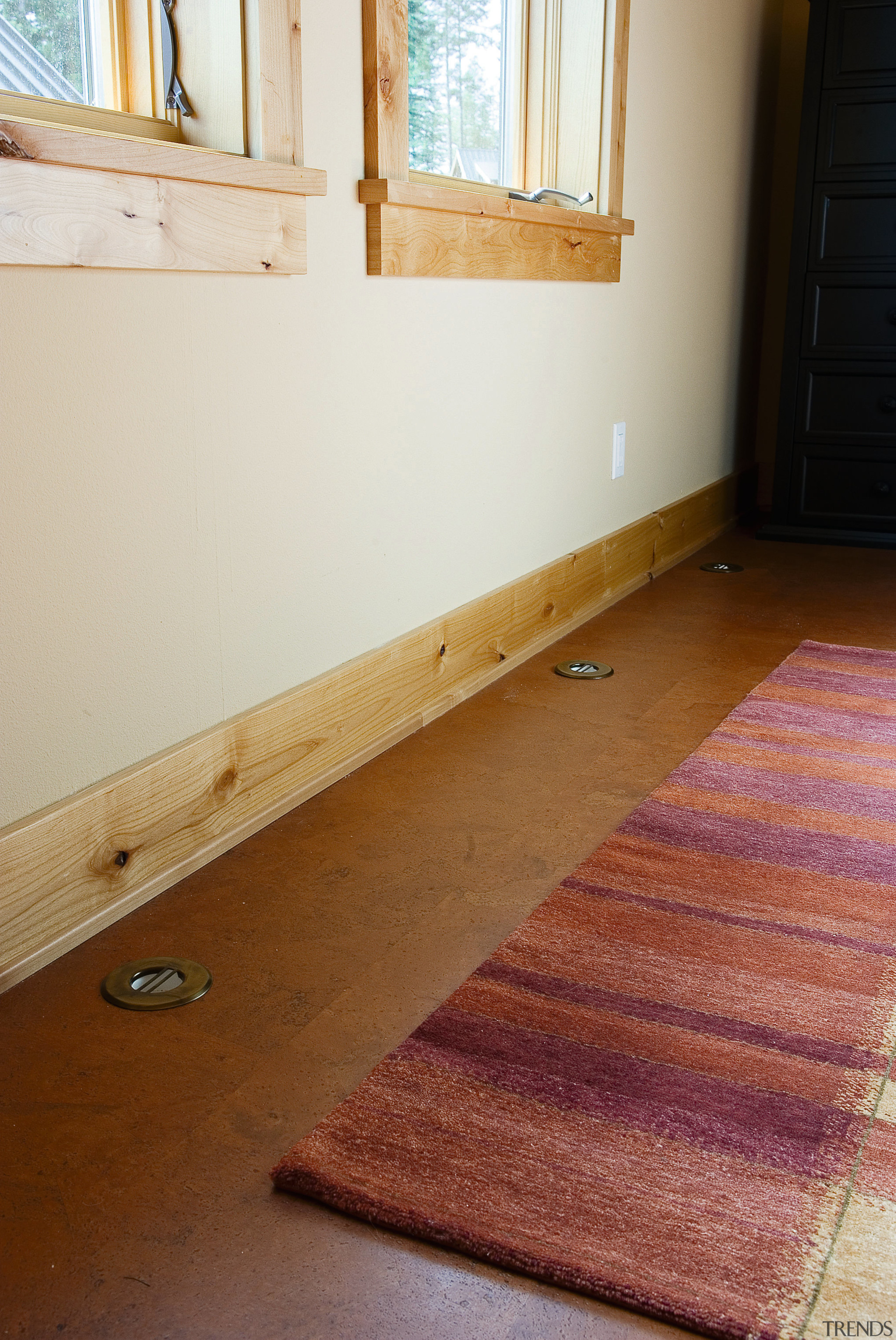 A view of the brass vents  that floor, flooring, hardwood, home, house, interior design, laminate flooring, plywood, room, table, tile, wall, wood, wood flooring, wood stain, brown