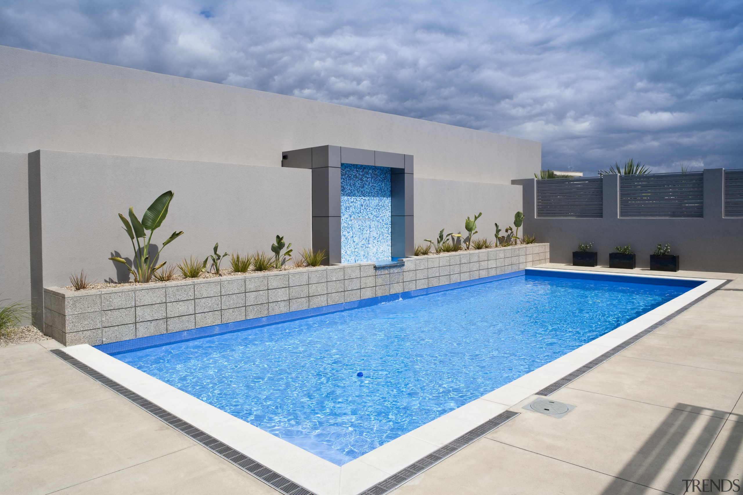 View of a paved pool area which features estate, house, leisure, property, real estate, swimming pool, villa, gray, teal