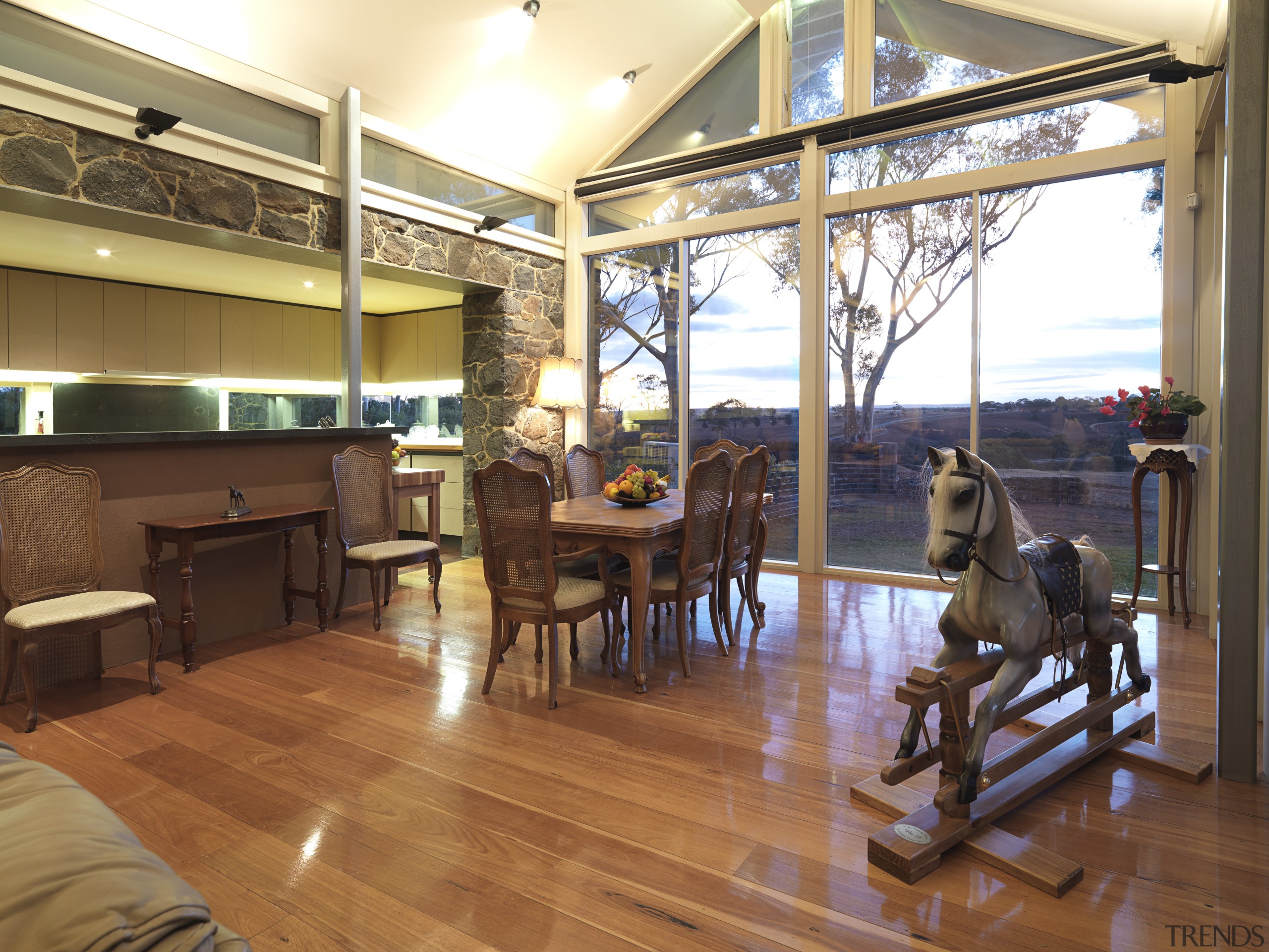 Bluestone, waxed timber and cream paintwork visually link floor, flooring, hardwood, home, interior design, living room, real estate, wood, wood flooring, brown