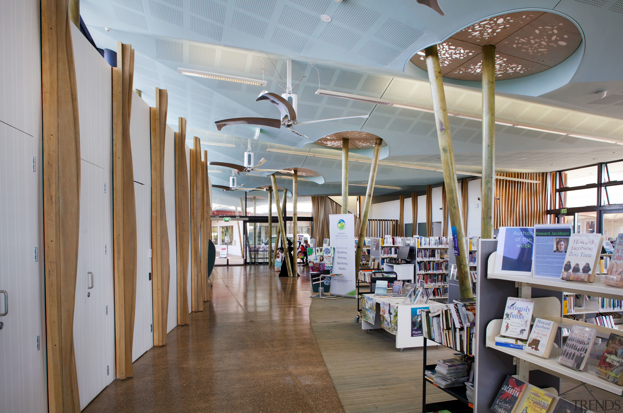 In the new Waiheke library, tall timber columns ceiling, institution, interior design, library, public library, gray, brown