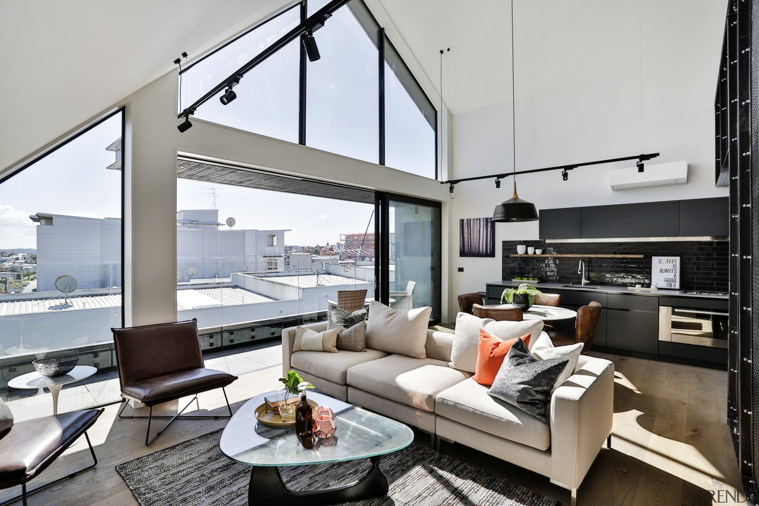 A semi-industrial look connects the interior fit-outs at house, interior design, living room, penthouse apartment, real estate, gray