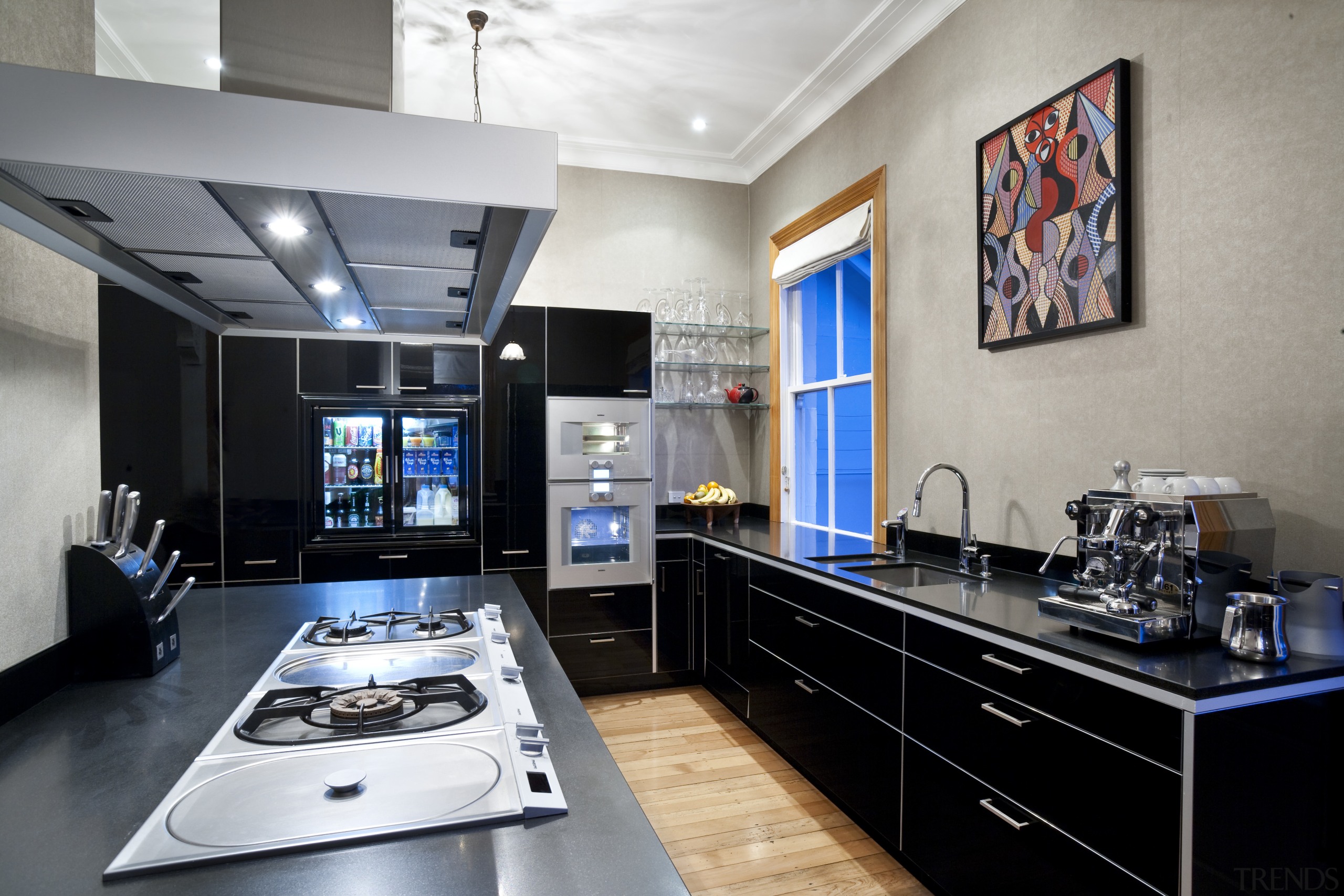 View of a contemporary kitchen which features a countertop, interior design, kitchen, gray, black