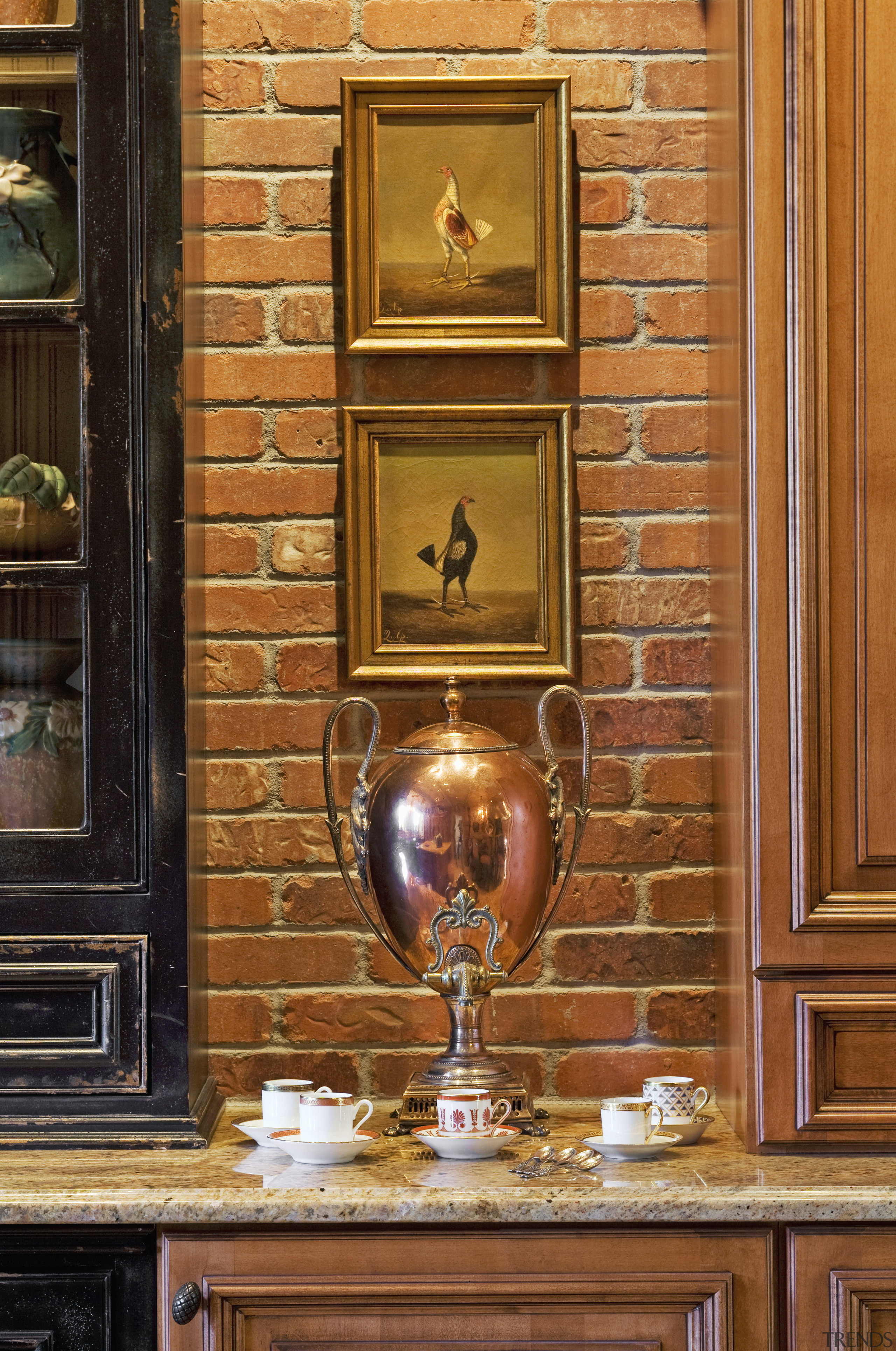 View of a traditional European-styled kitchen which features furniture, interior design, wall, wood, brown