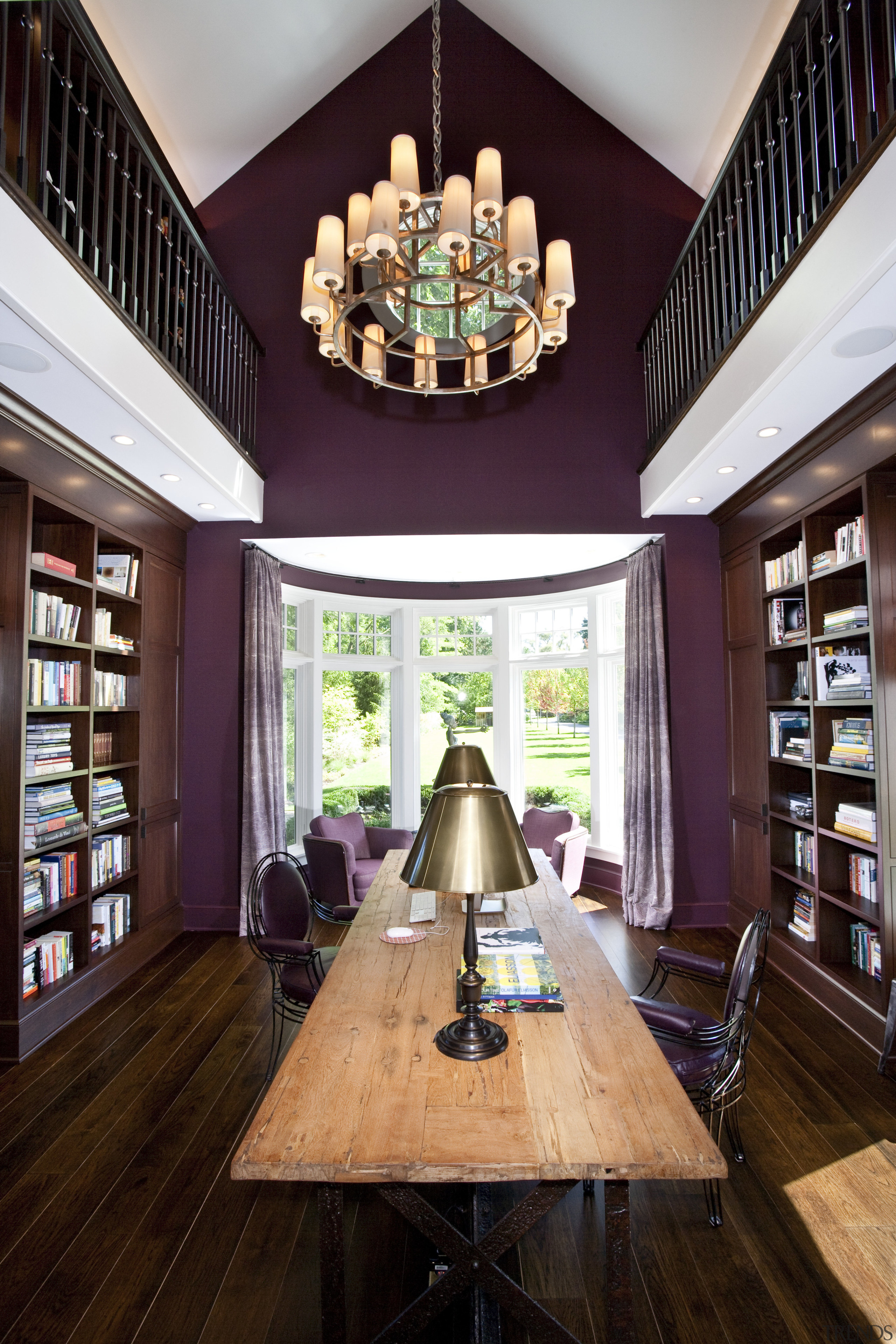 View of the library featuring dark painted walls, ceiling, dining room, home, interior design, library, living room, room, black