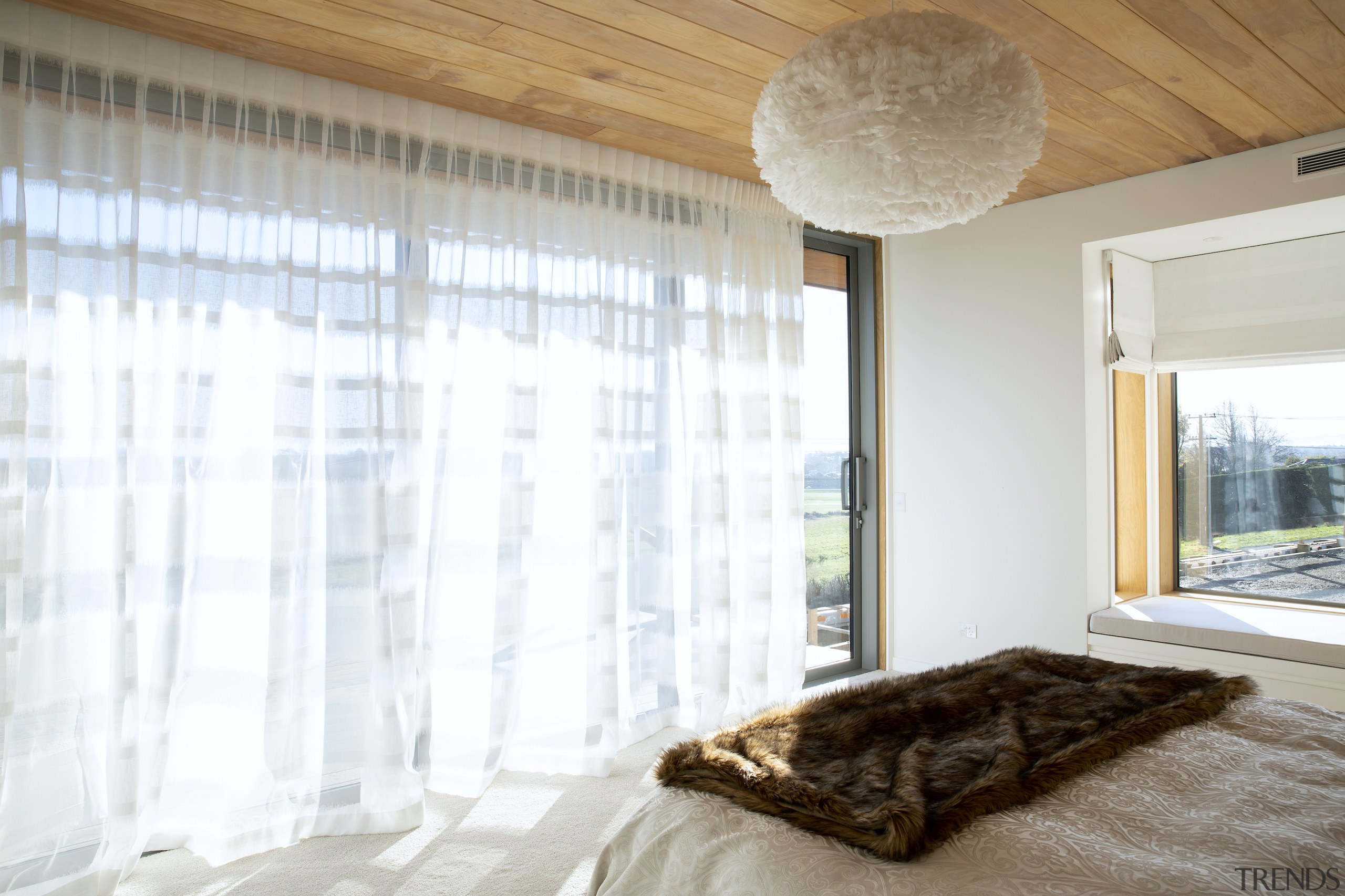 The ensuite's light, airy feel is a continuation 