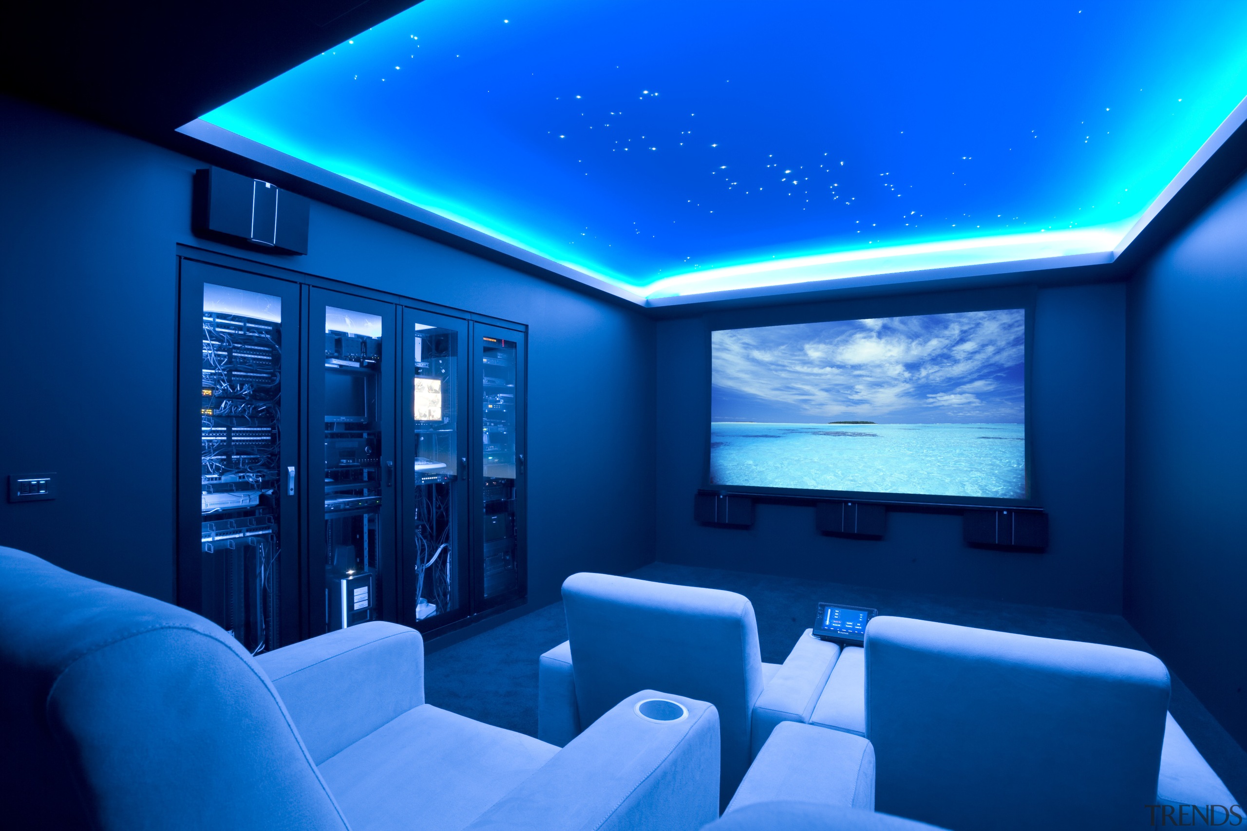 View of home cinema with projector screen, audiovisual blue, ceiling, display device, interior design, lighting, room, technology, blue