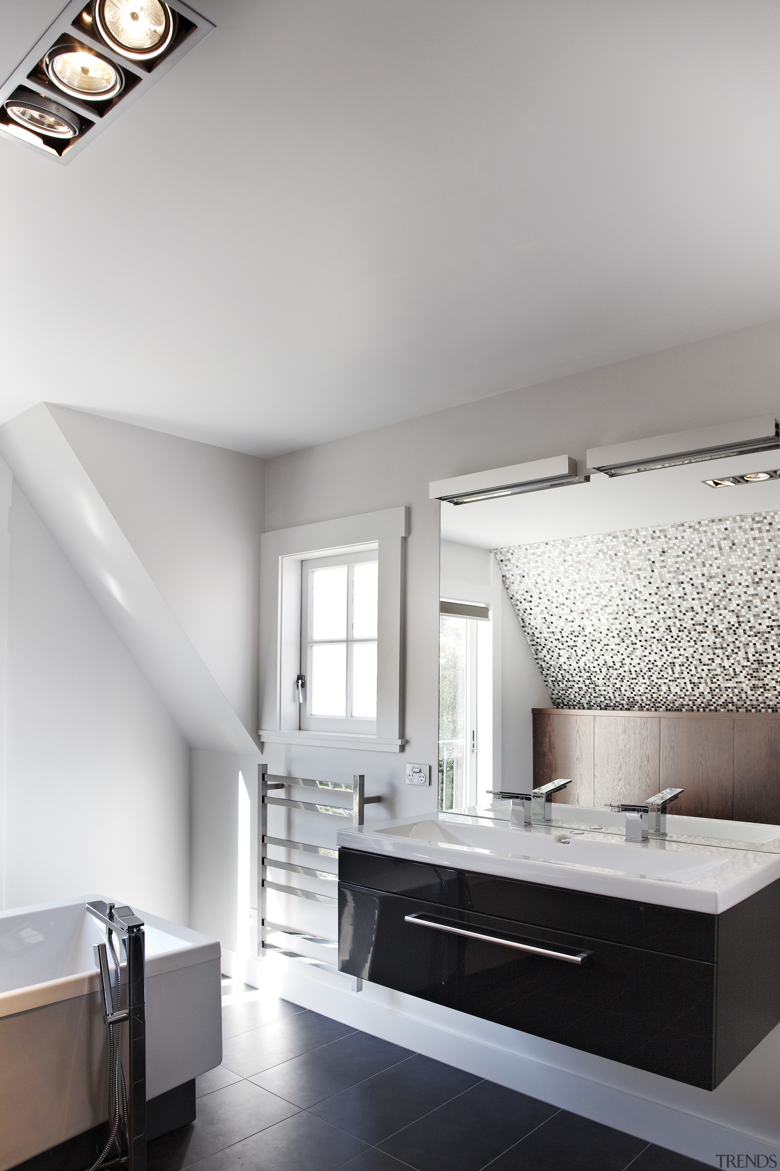 The houses architecture echoes the existing Arts and architecture, bathroom, ceiling, daylighting, floor, home, interior design, room, sink, tap, wall, gray, white