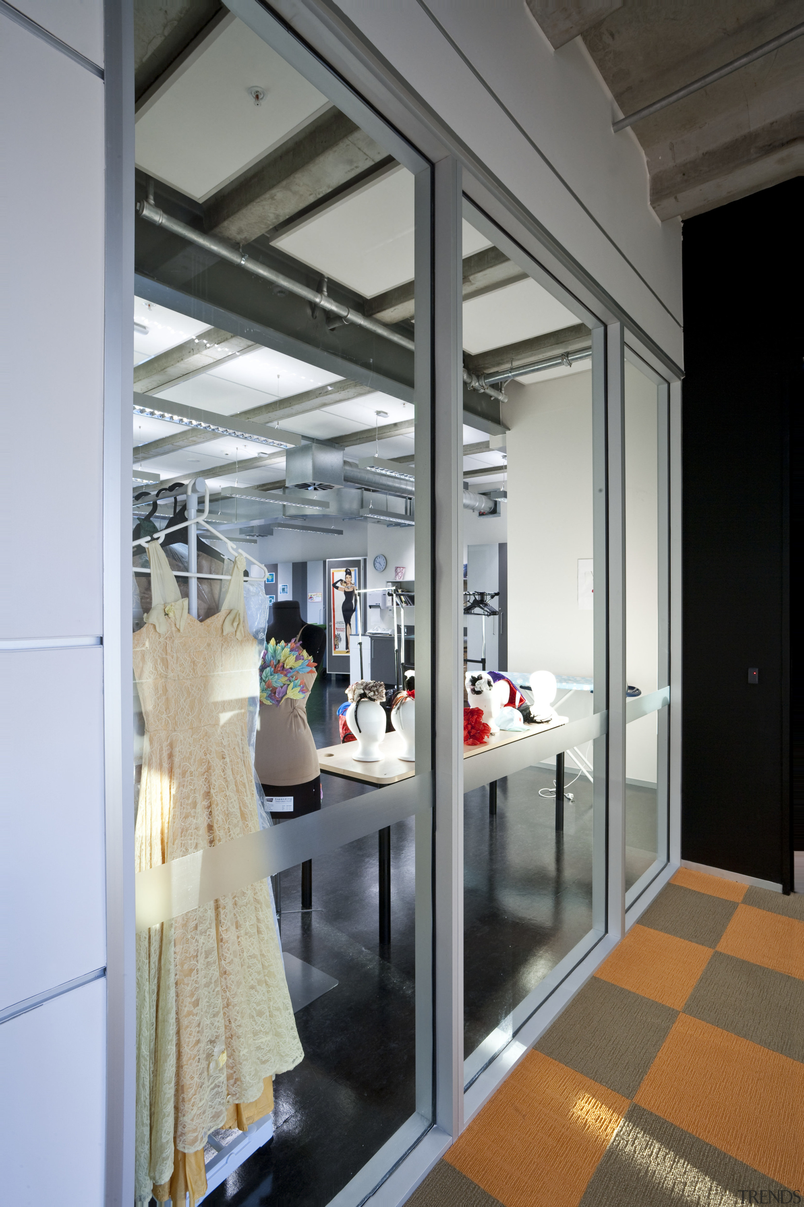 View of the interior of this office - ceiling, door, glass, interior design, window, gray