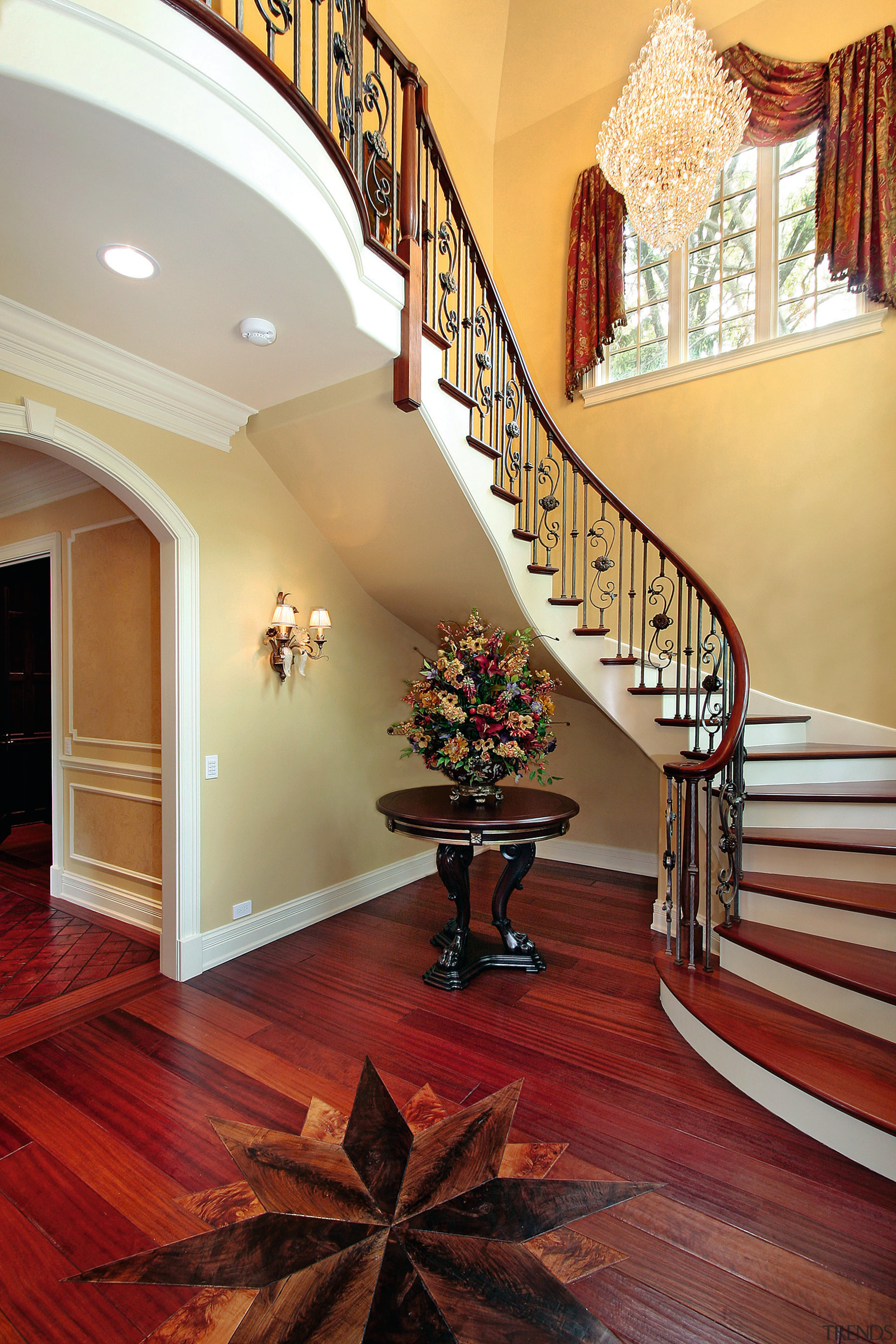 With a repeating pattern of three baluster styles ceiling, estate, floor, flooring, handrail, hardwood, home, interior design, laminate flooring, living room, lobby, real estate, room, stairs, wall, wood, wood flooring, red