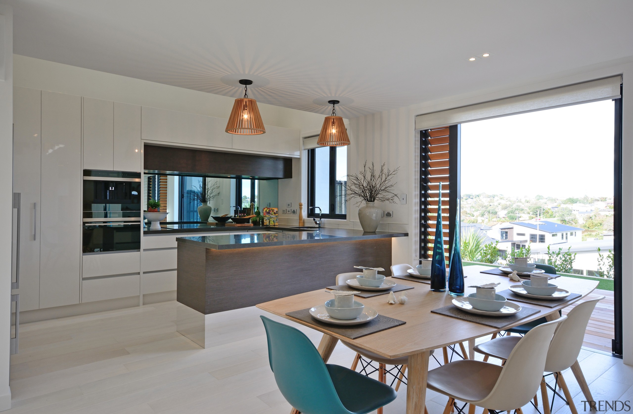 Contemporary Jalcon Homes show home with bagged brick dining room, house, interior design, kitchen, living room, property, real estate, room, table, gray