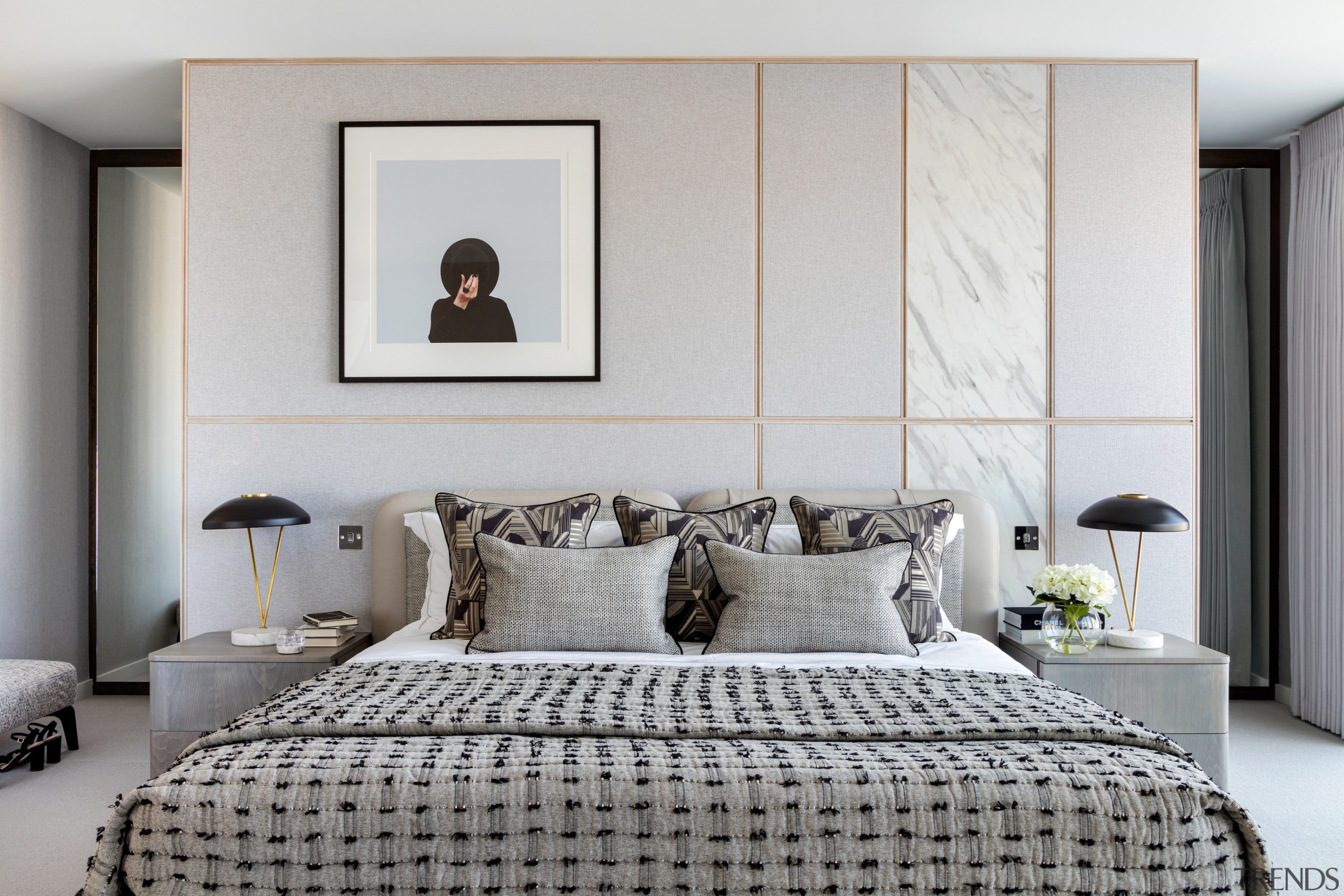 The master bedroom sports, soft, pebble-like tones. "We used 