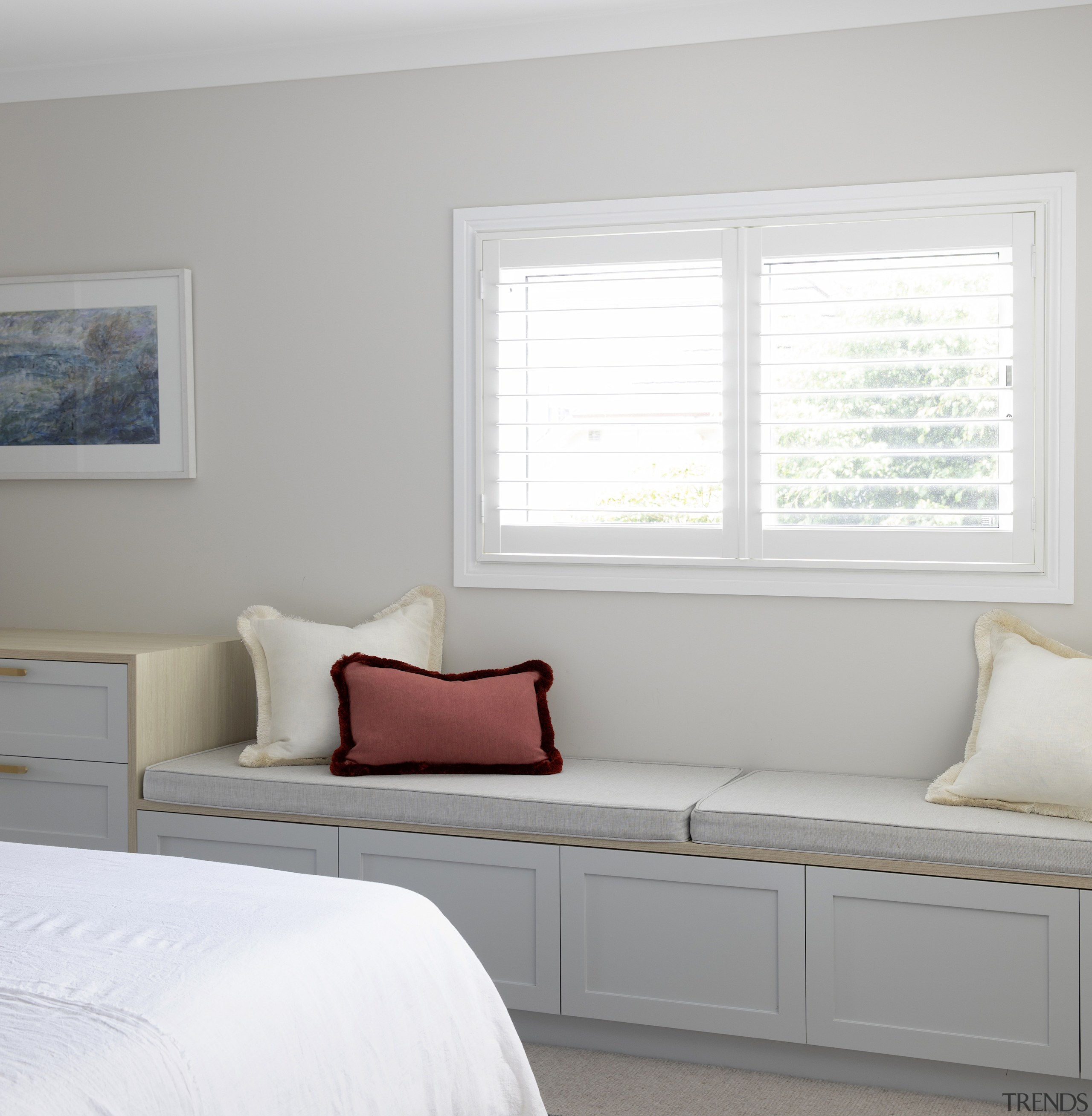 A window seat comes with built in storage. 