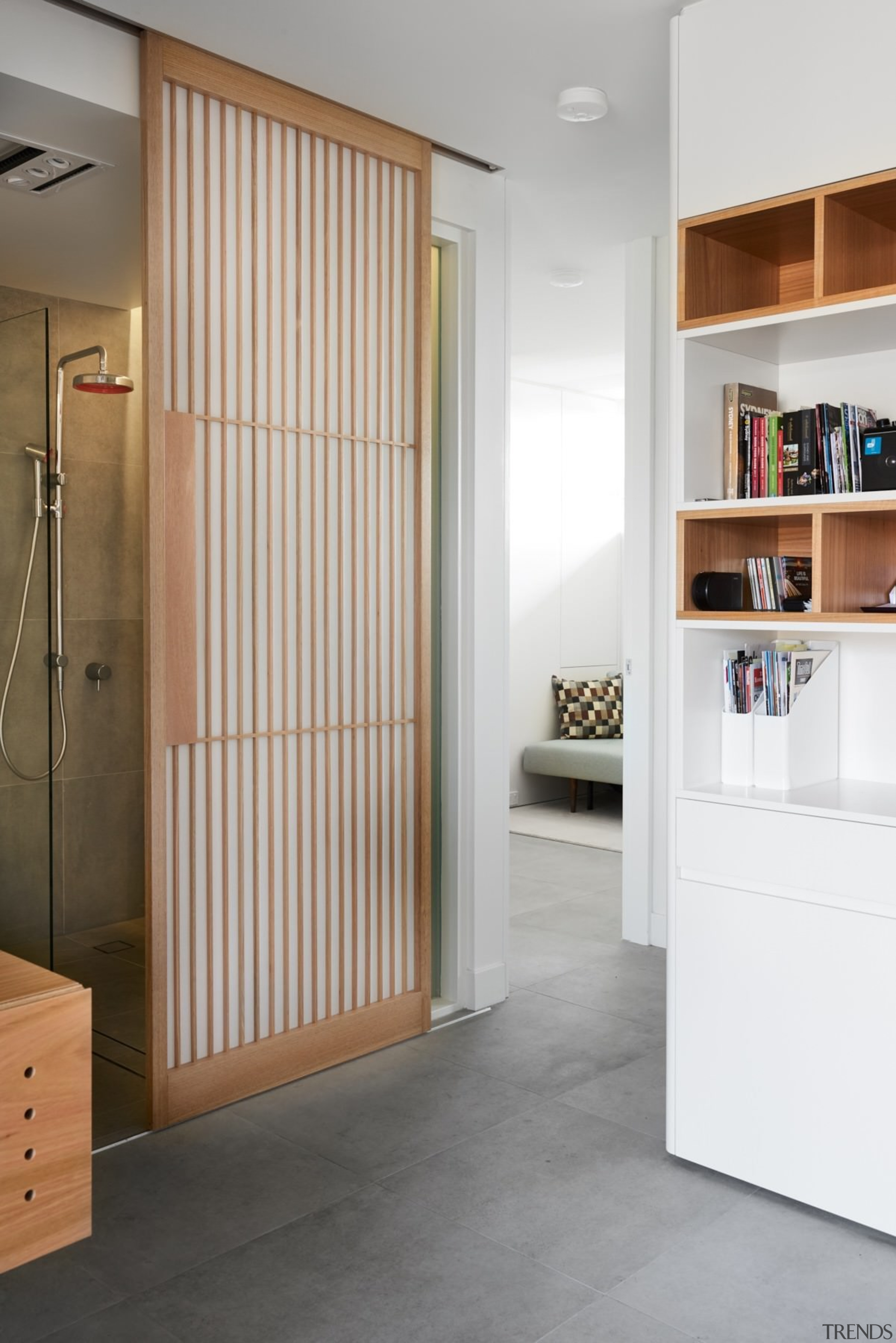 The hallway weaves between these different rooms - cabinetry, door, floor, furniture, interior design, product, wardrobe, gray