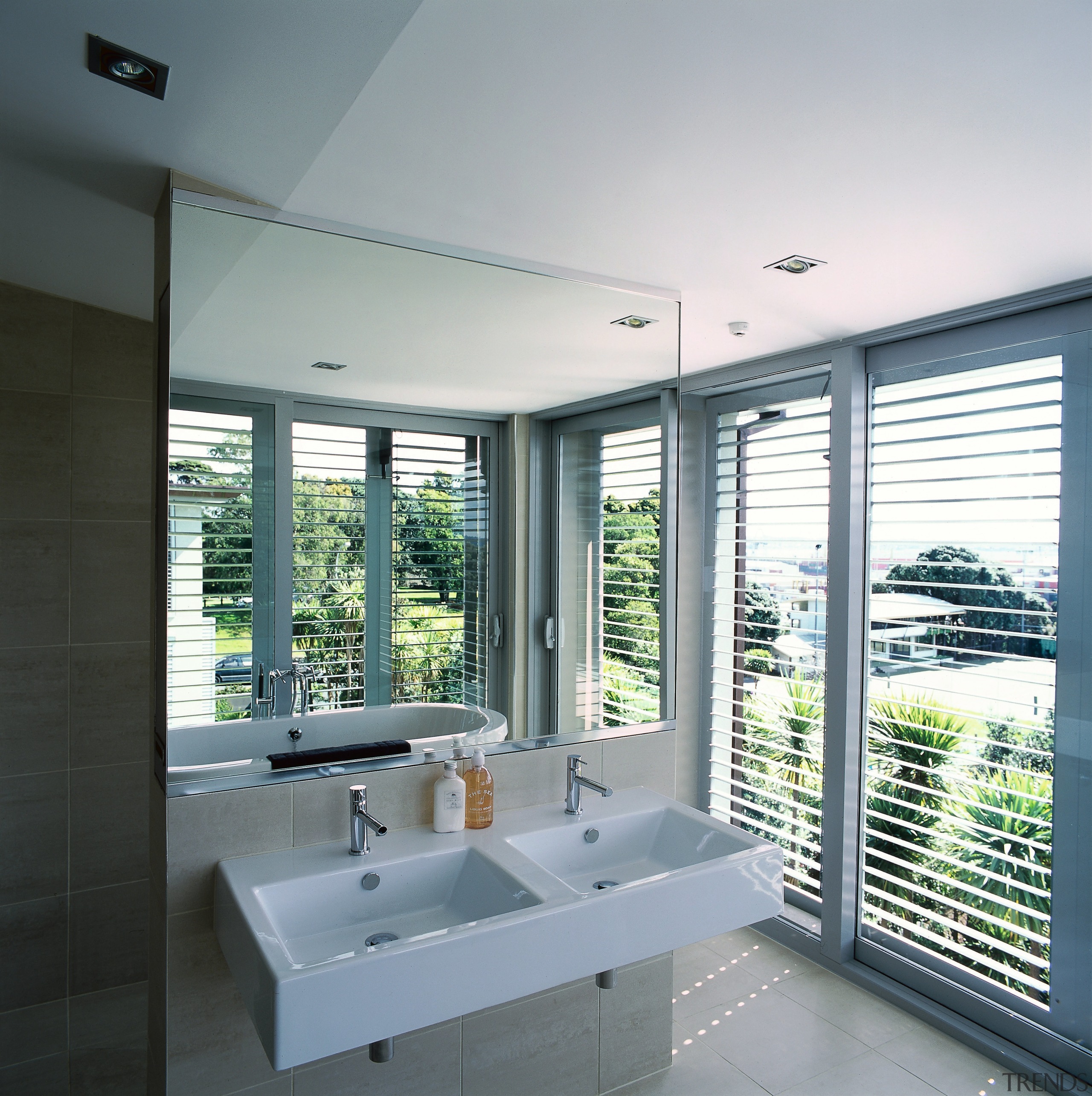 A view of the bathroom, white tiled walls architecture, bathroom, daylighting, house, interior design, real estate, window, gray