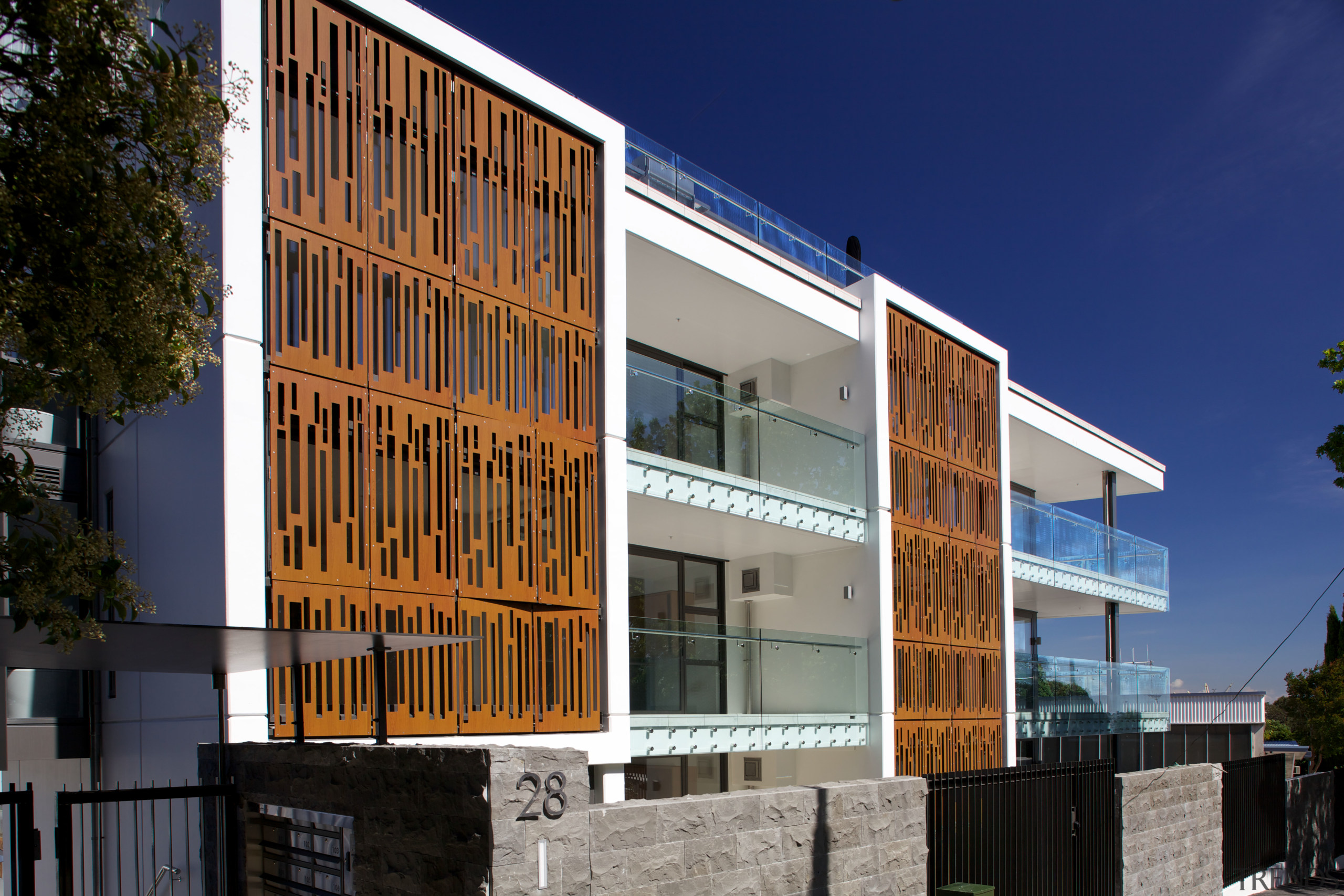 Powdercoated aluminium screens that resemble Corten steel feature apartment, architecture, building, commercial building, condominium, corporate headquarters, elevation, facade, home, house, mixed use, neighbourhood, property, real estate, residential area, window, blue, black