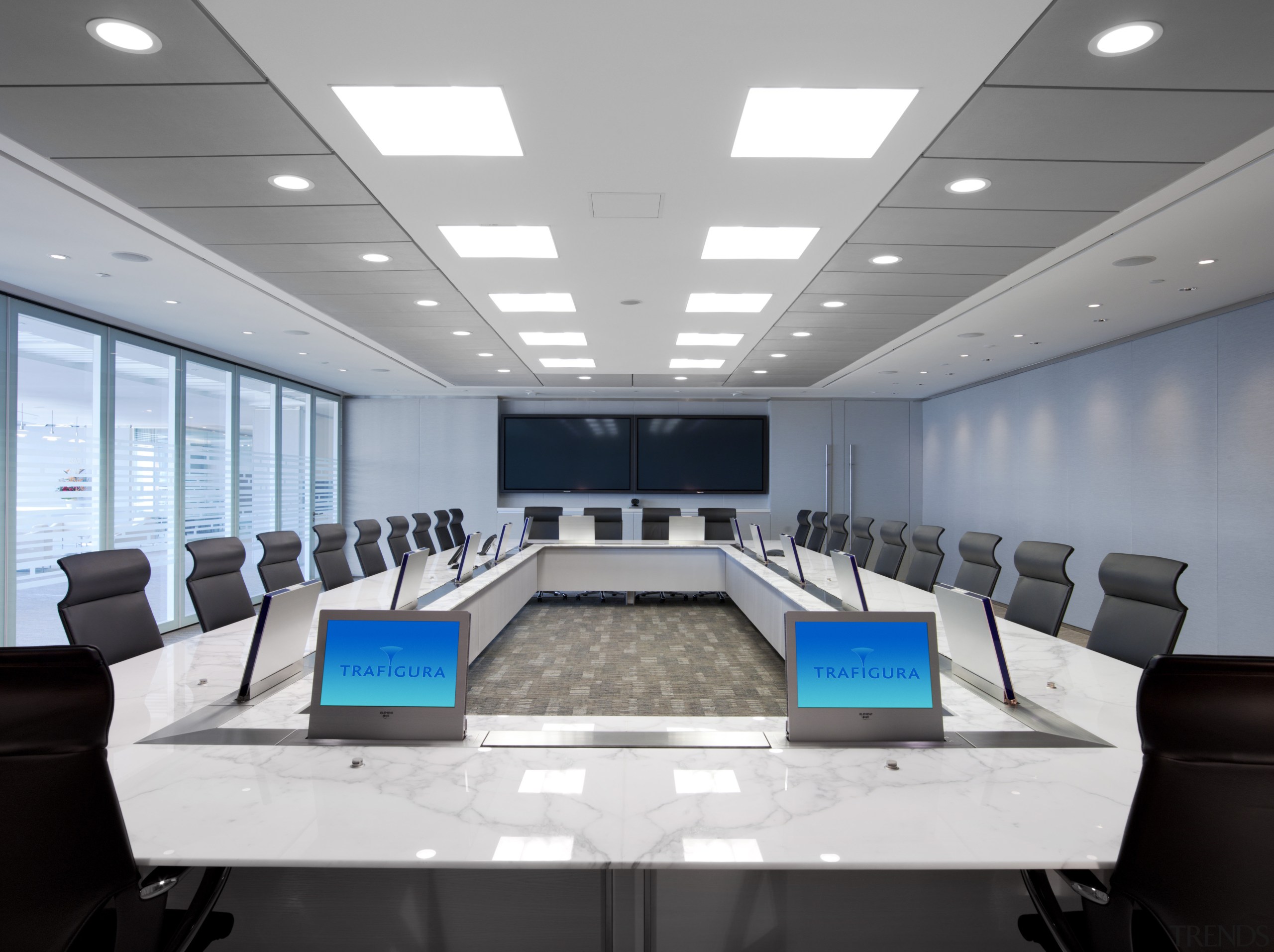 The boardroom of the Trafigura office is fitted ceiling, conference hall, interior design, office, gray, white