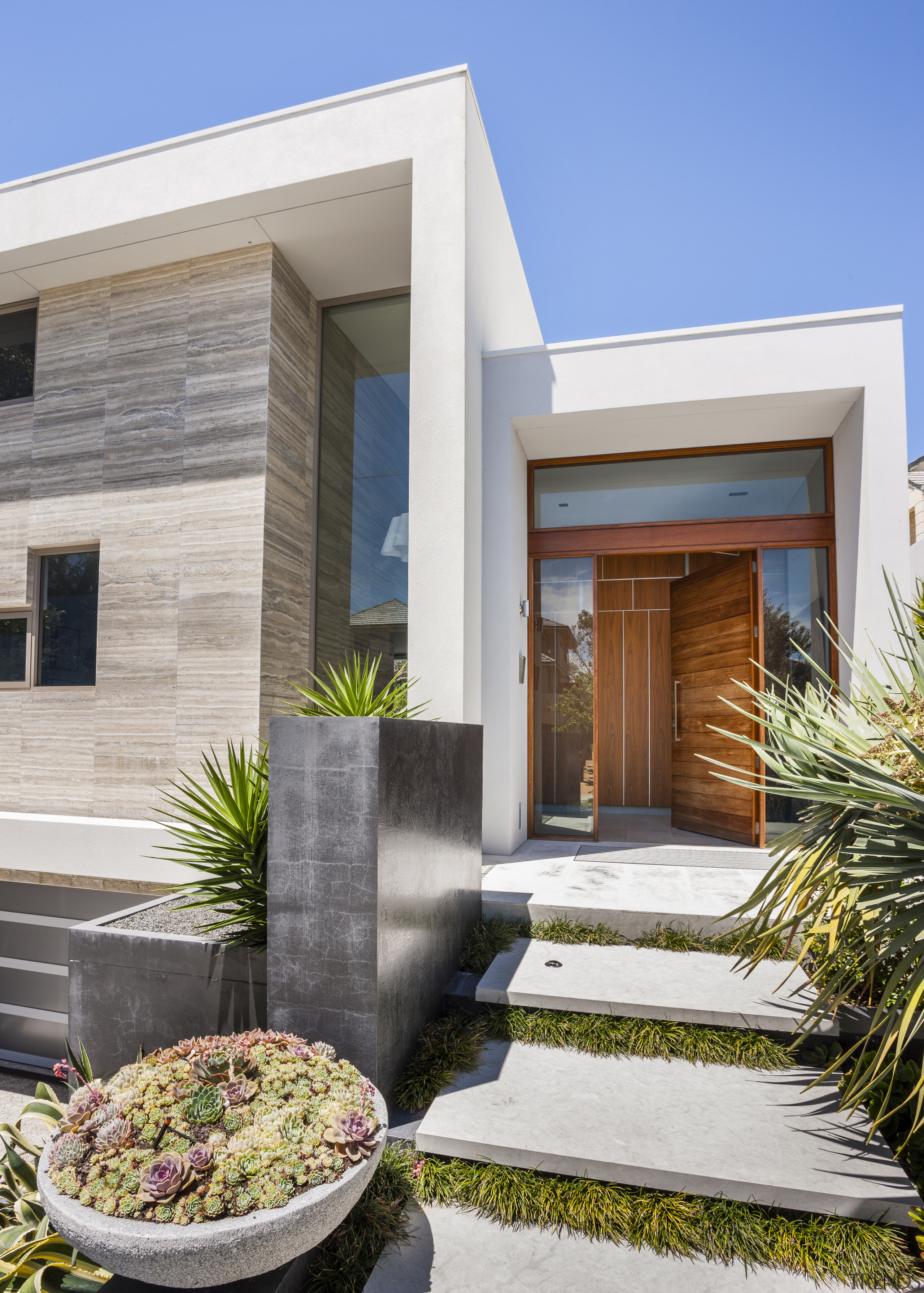 The silver travertine facade provides a solid barrier architecture, estate, facade, home, house, property, real estate, residential area, white