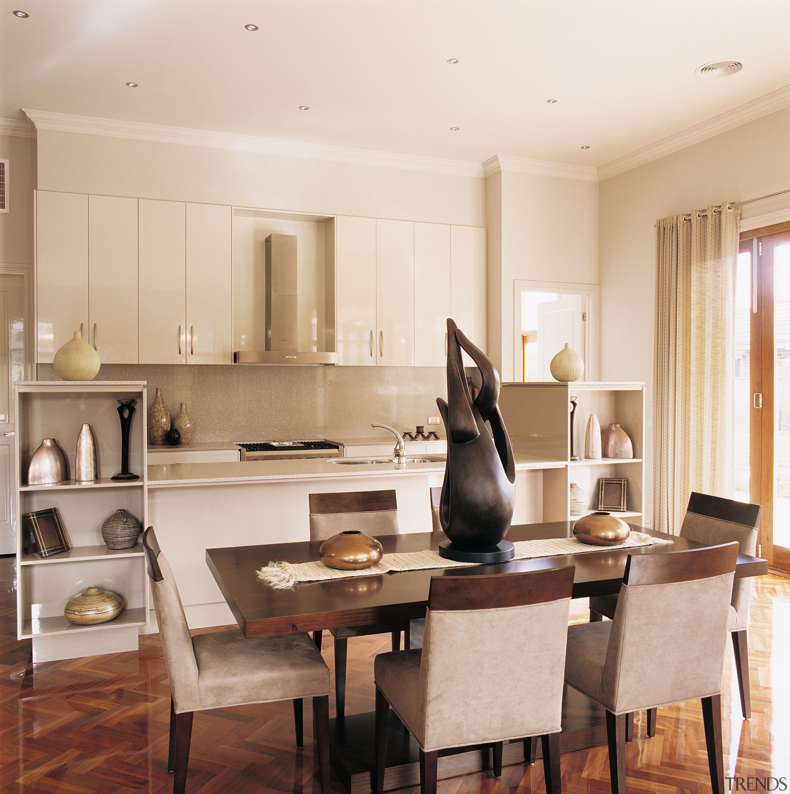 A view of a NSD Home with Kleenmaid countertop, dining room, flooring, furniture, interior design, kitchen, room, table, white