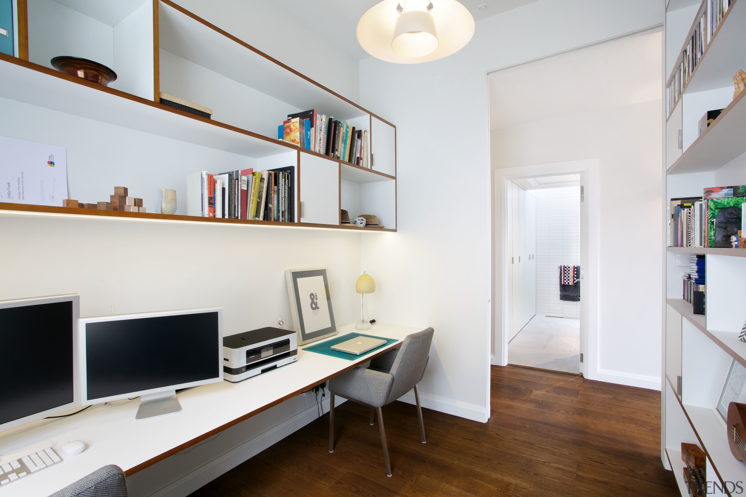 Shelving and desking in this study repeats a apartment, furniture, home, interior design, office, real estate, room, shelf, shelving, white